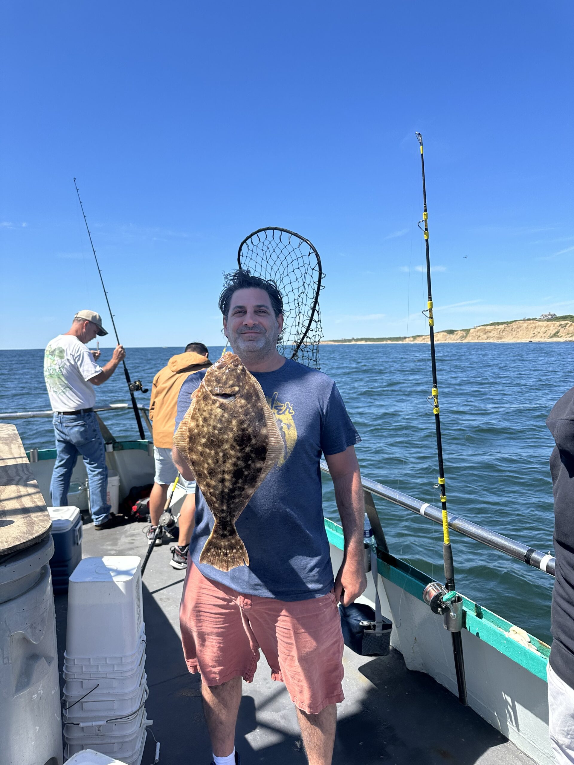 a group of people on a boat in the water