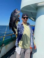 a person standing posing for the camera