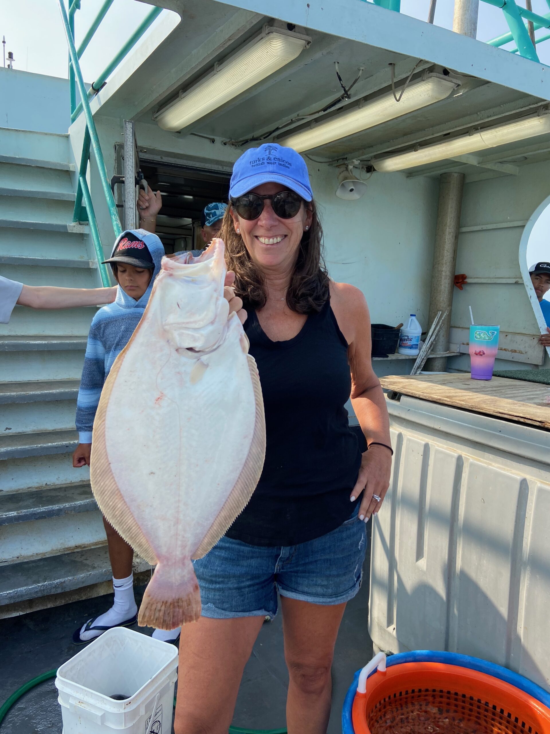 a person holding a fish