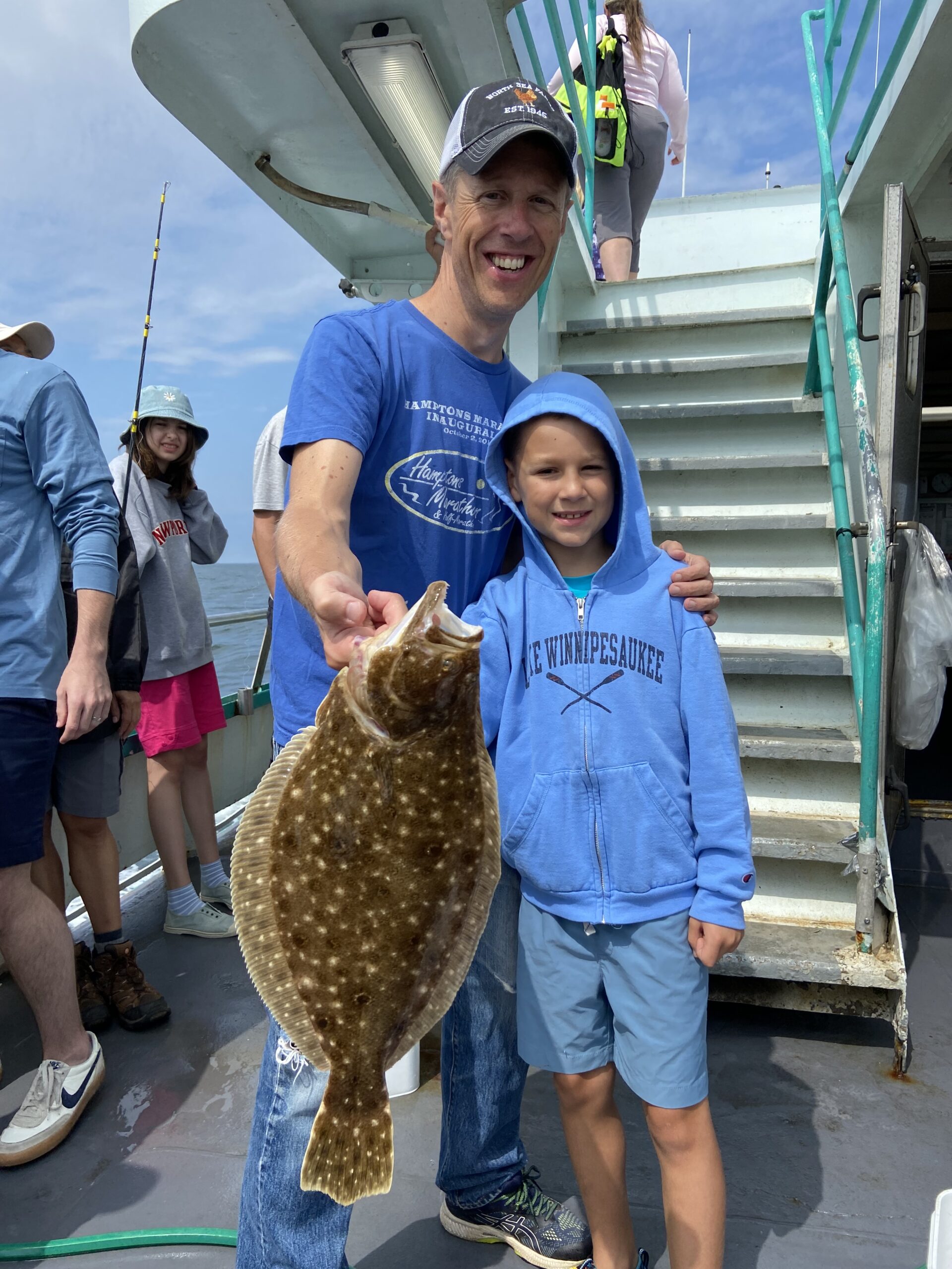 a couple of people that are standing in front of a building