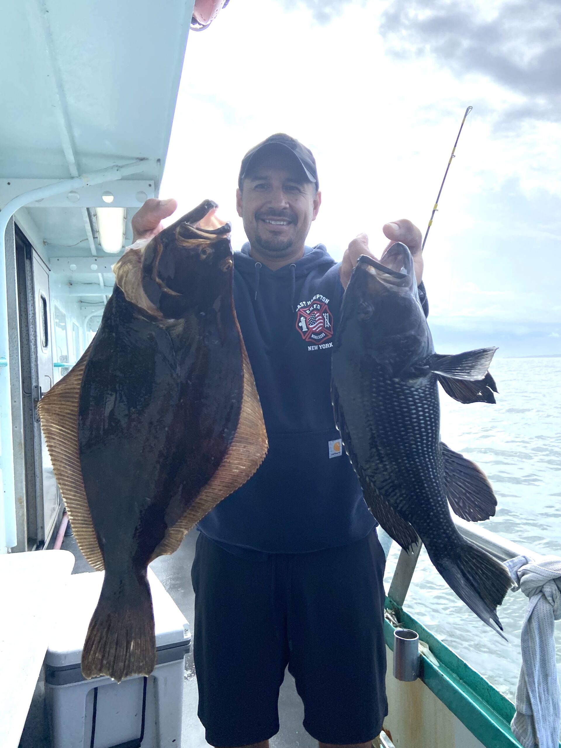 a person holding a fish