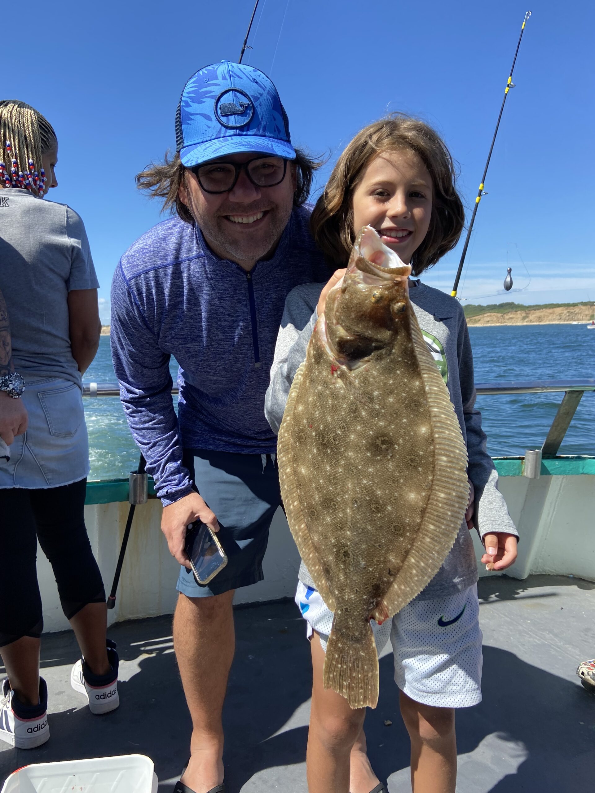 a person holding a fish