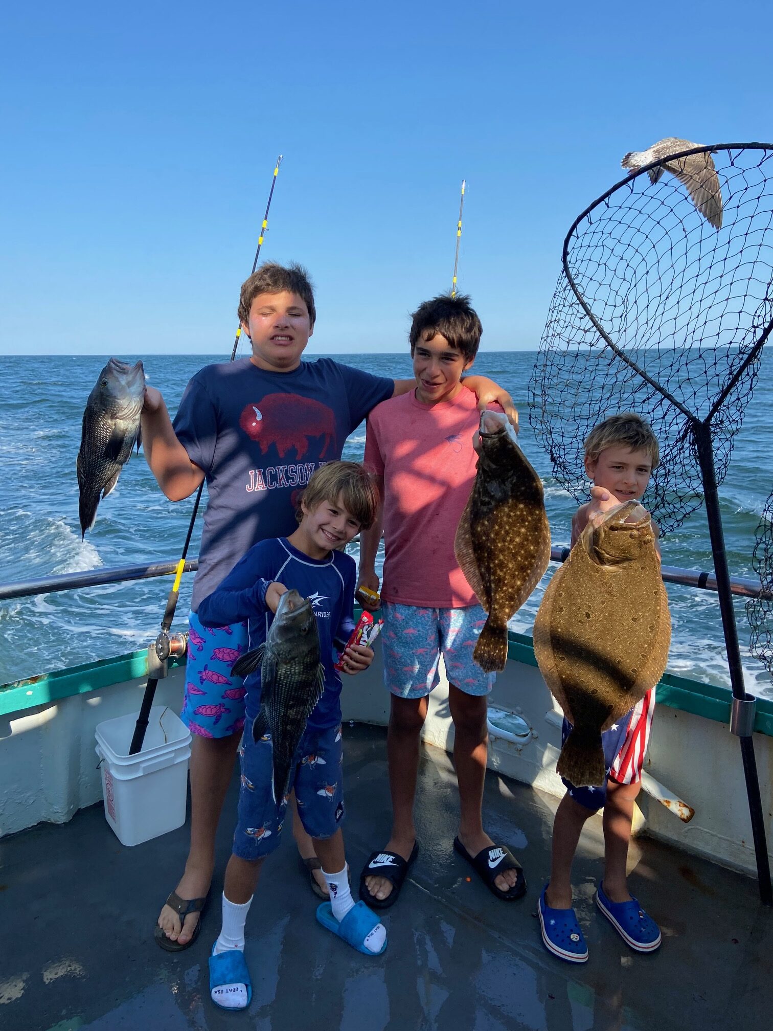 a group of people that are standing in the water