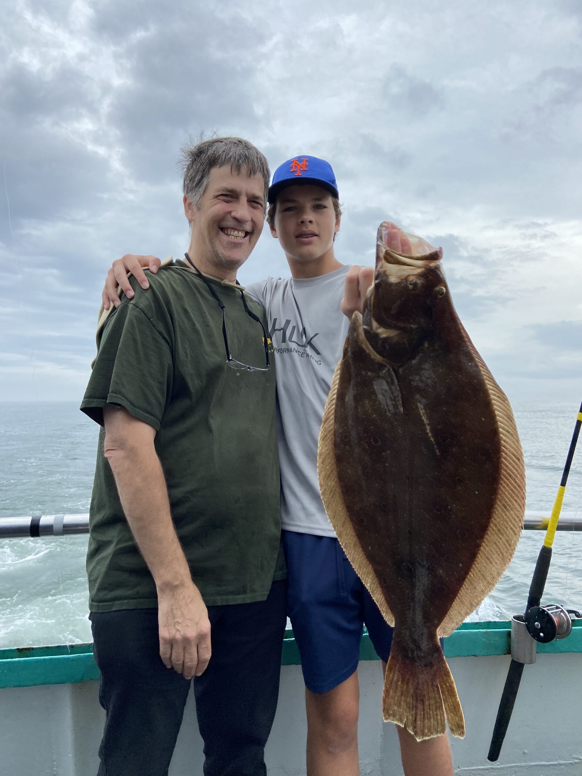 a man holding a fish