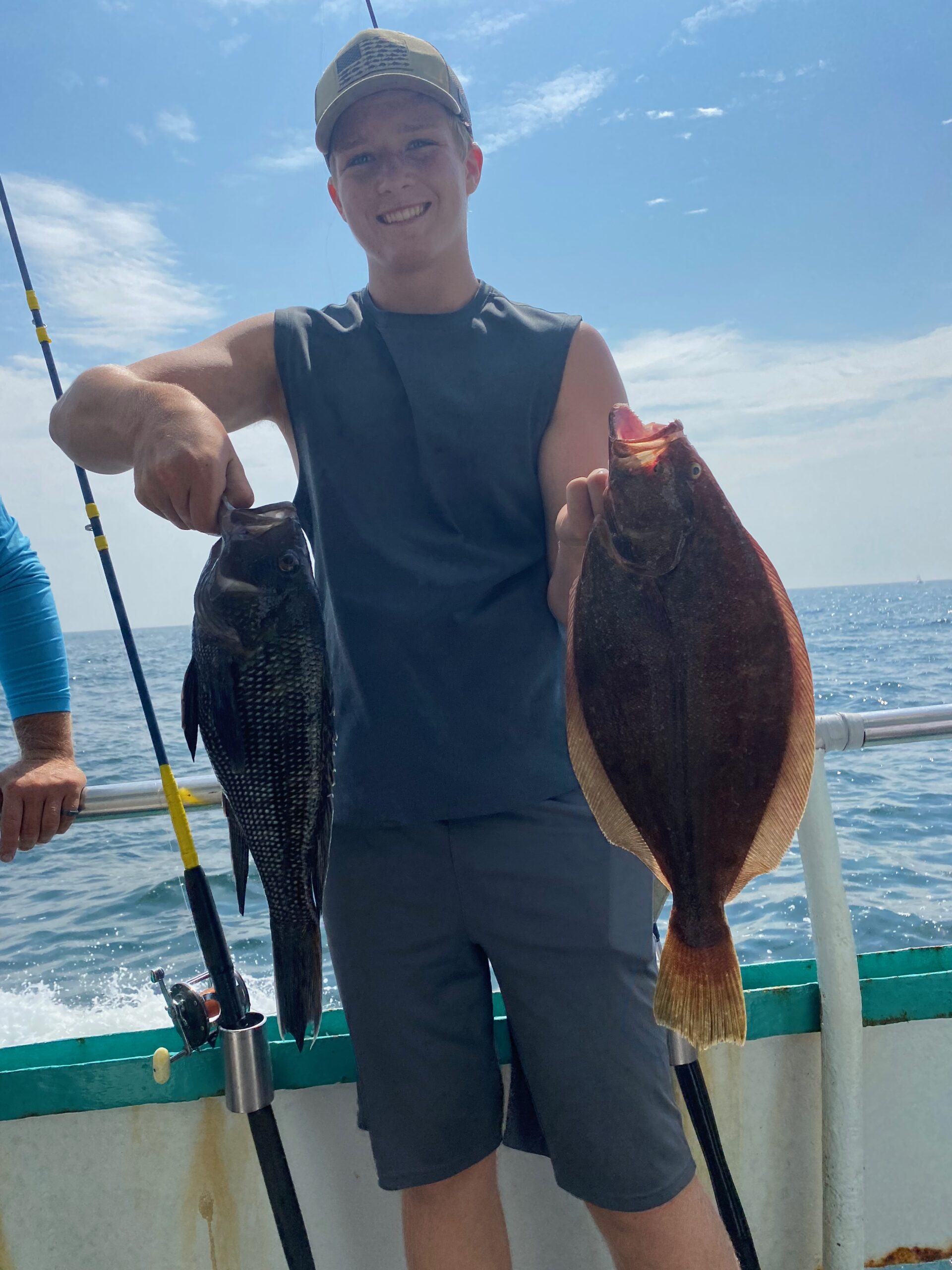 a person holding a fish