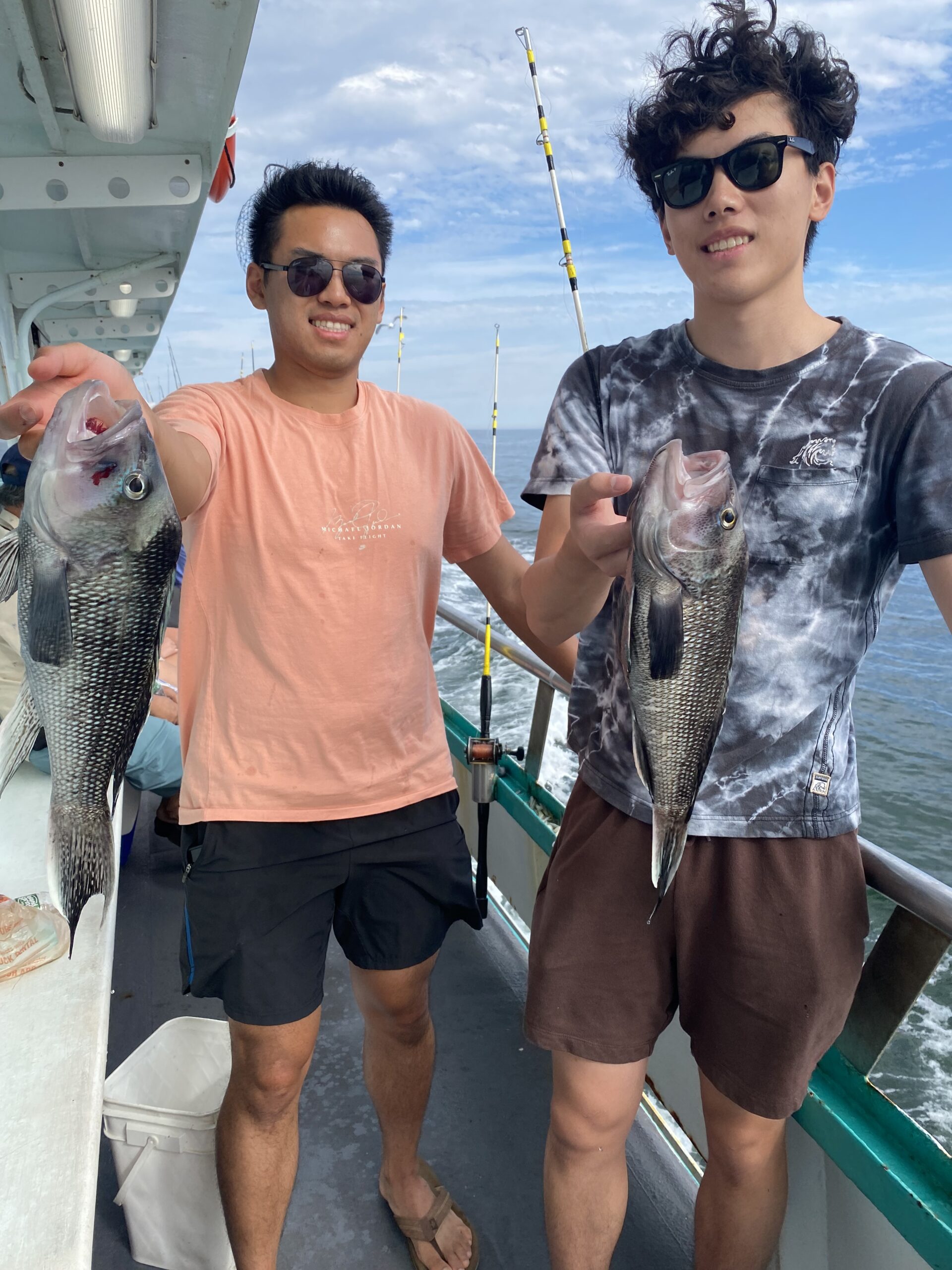 a person holding a fish