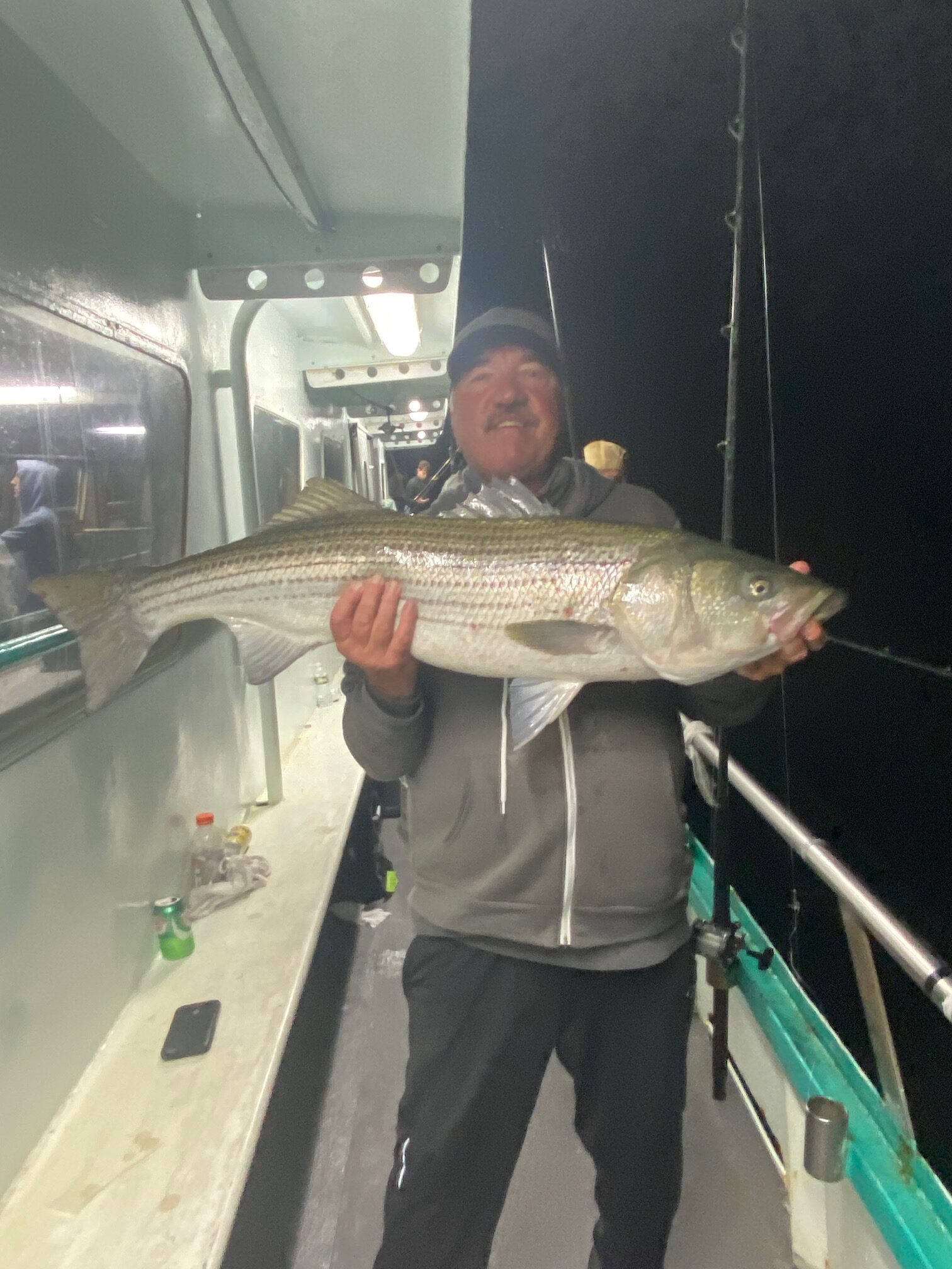 a man holding a fish