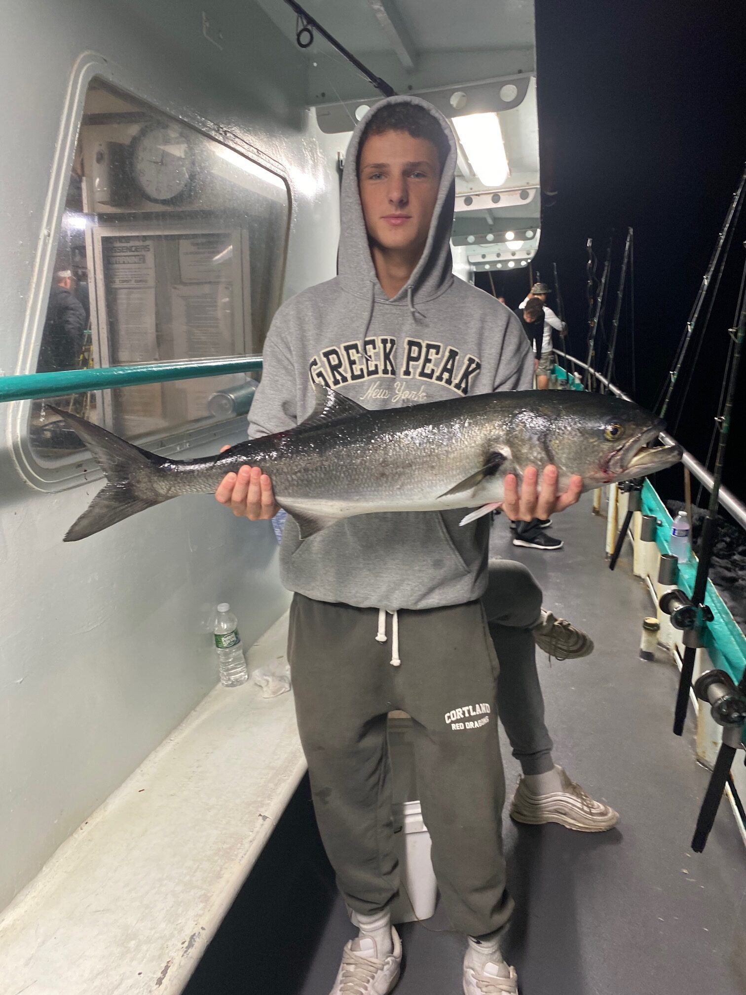 a person holding a fish