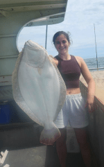a person holding a fish