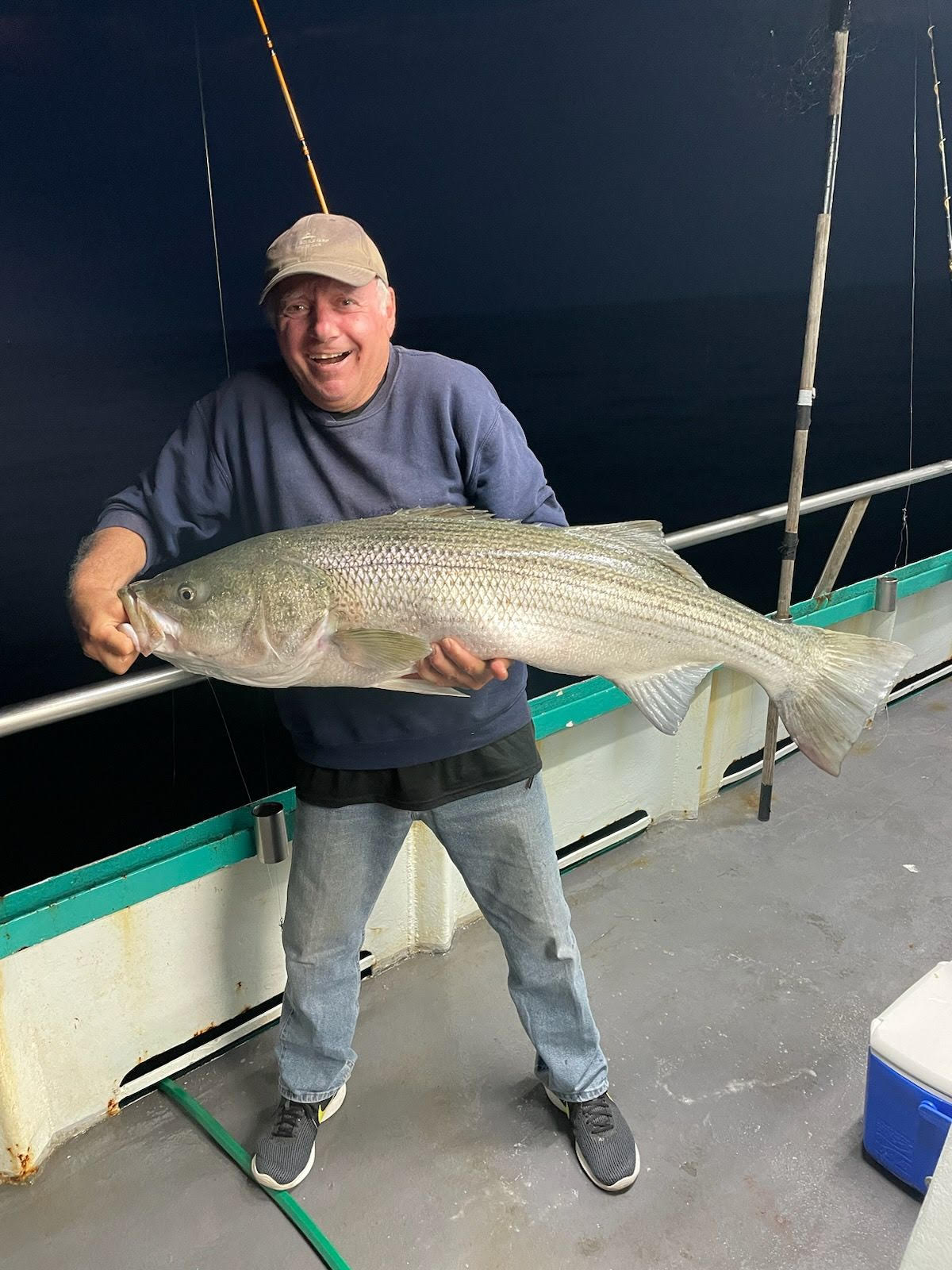 a person holding a fish