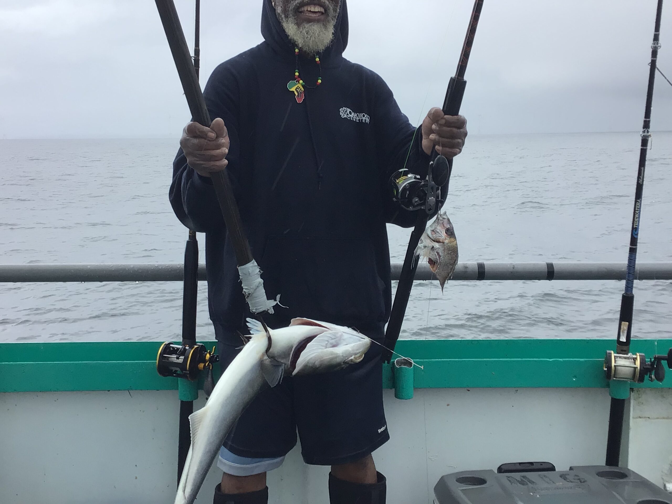 a man standing on a boat in the water