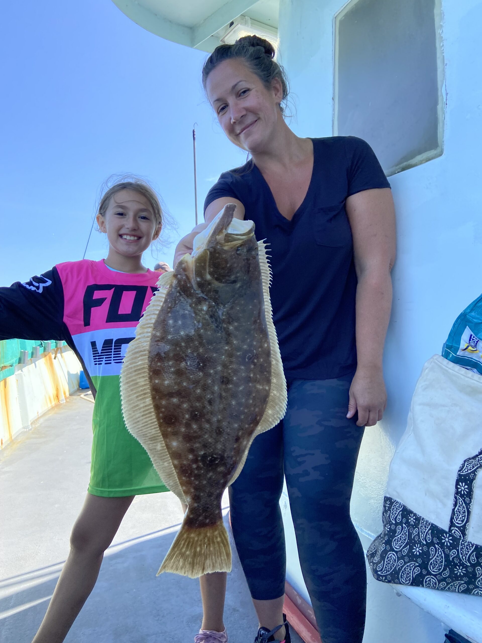 a person holding a fish