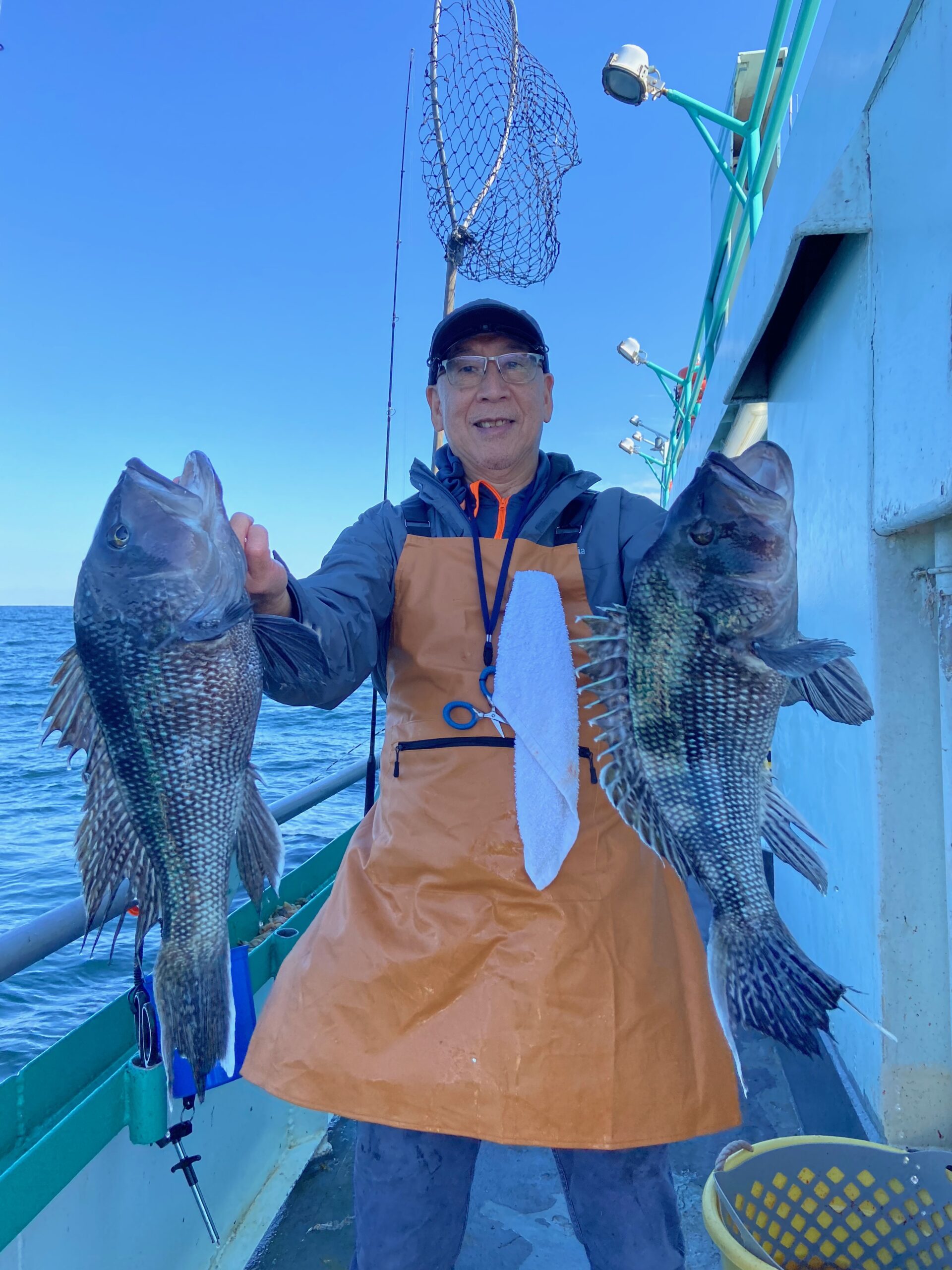 a person holding a fish