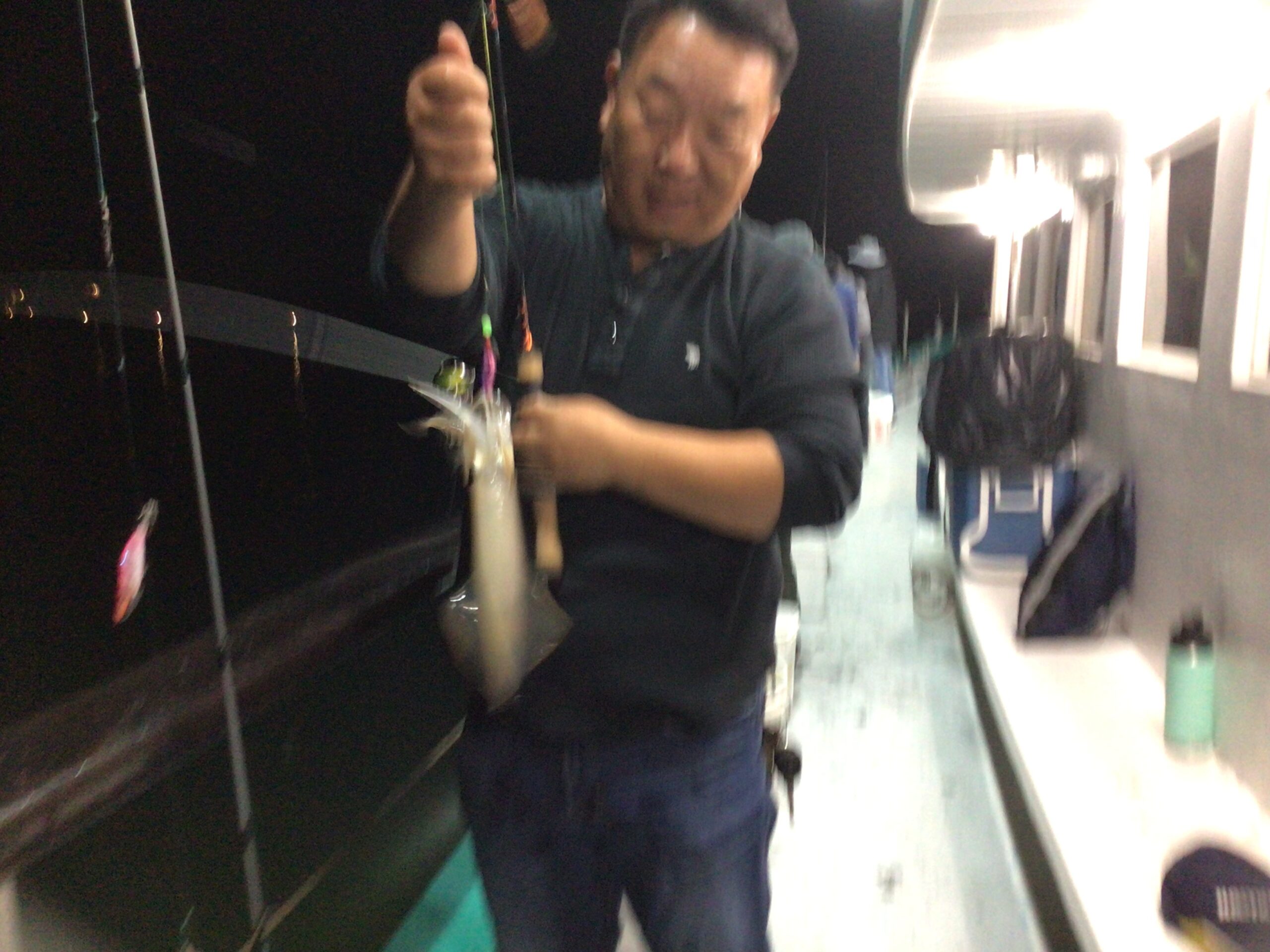 a man that is standing in the rain