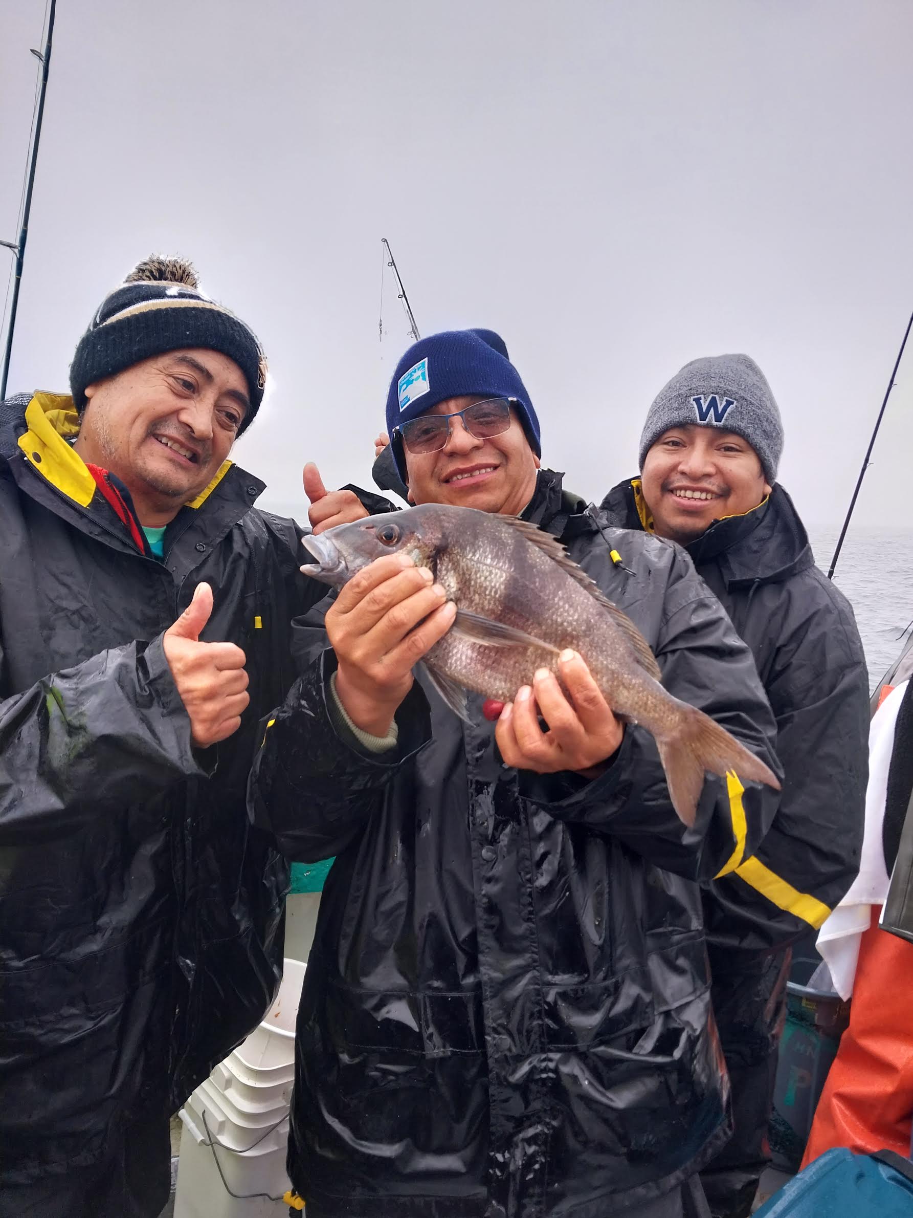 a person holding a fish