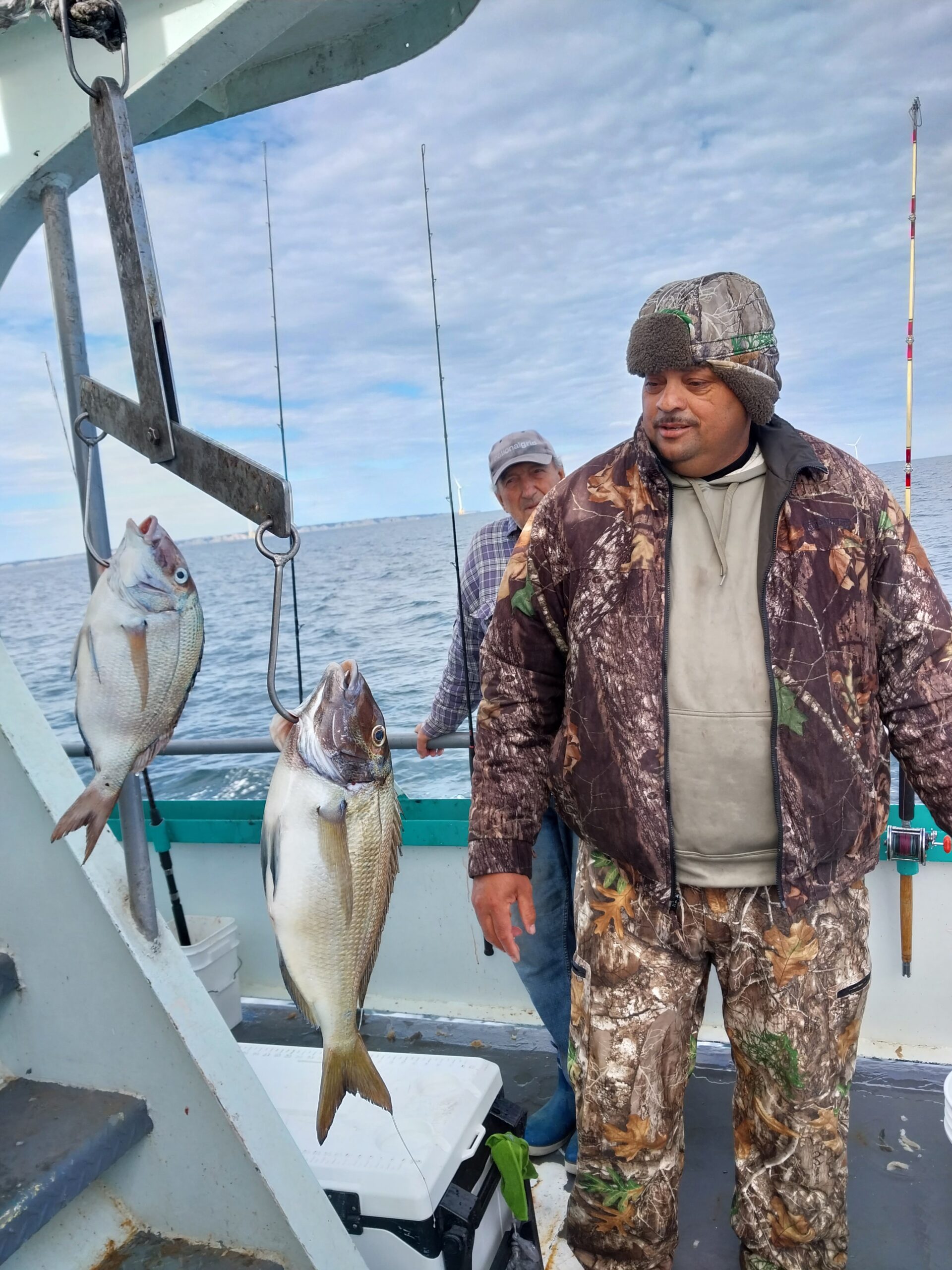 a person holding a fish