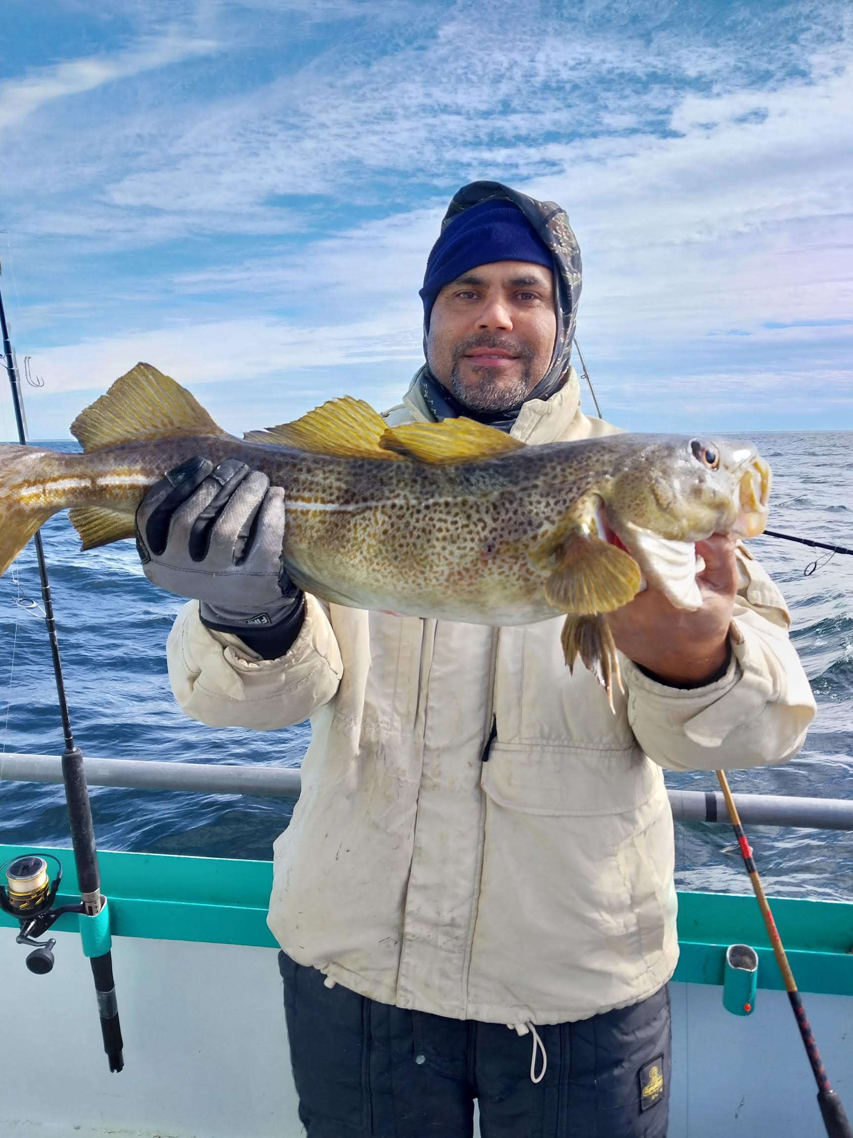 a person holding a fish