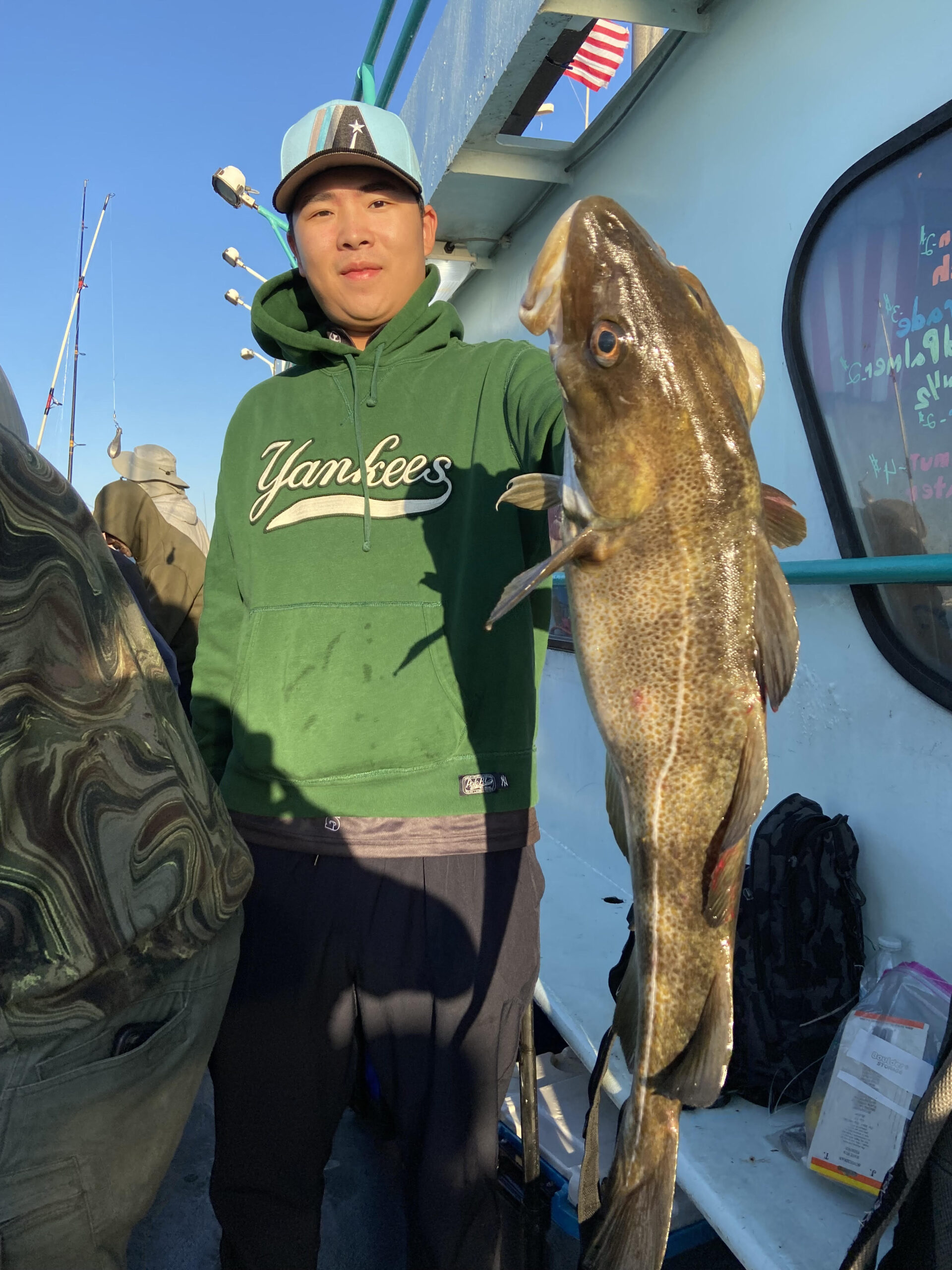 a person holding a fish