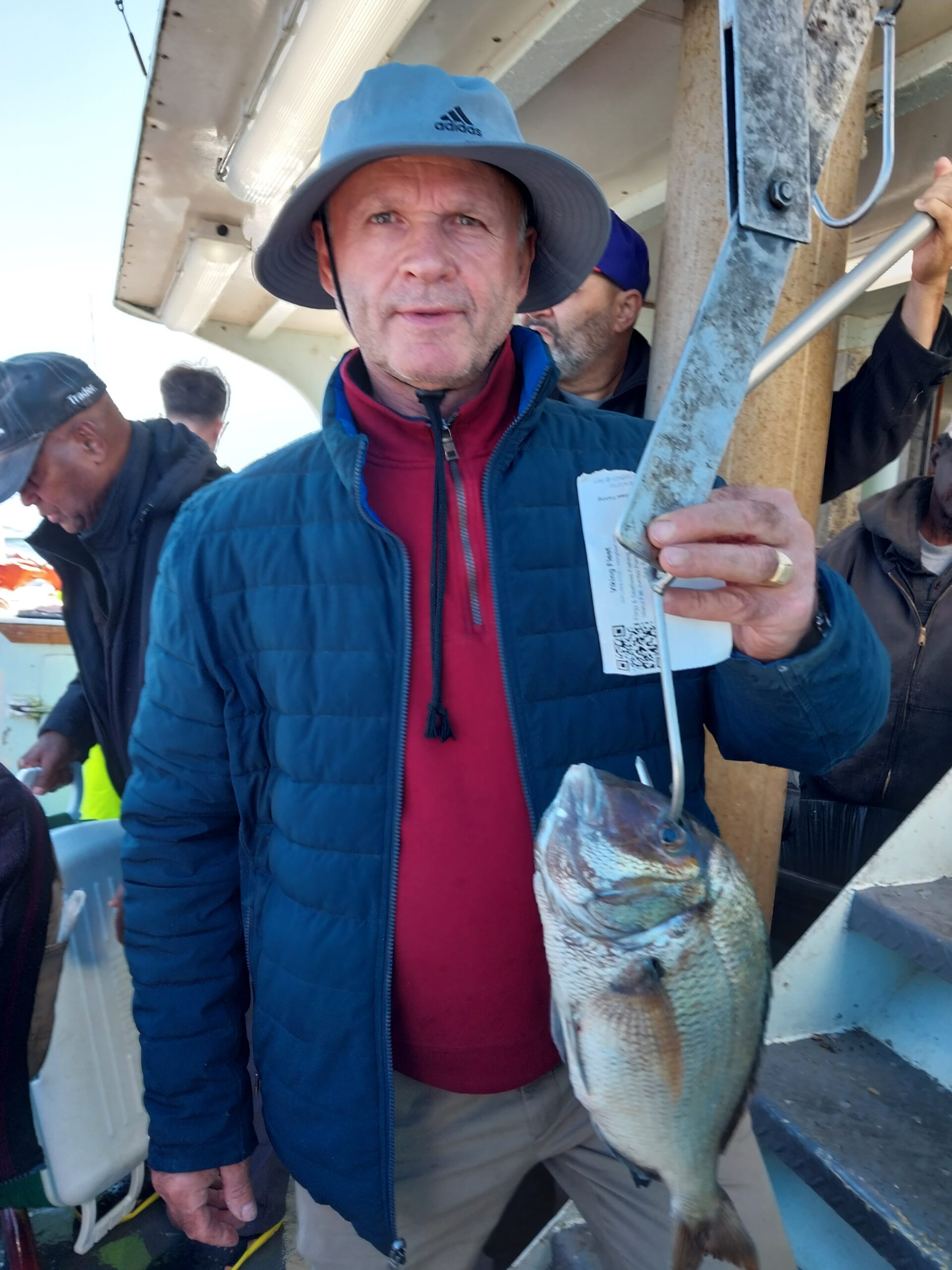 a person holding a fish