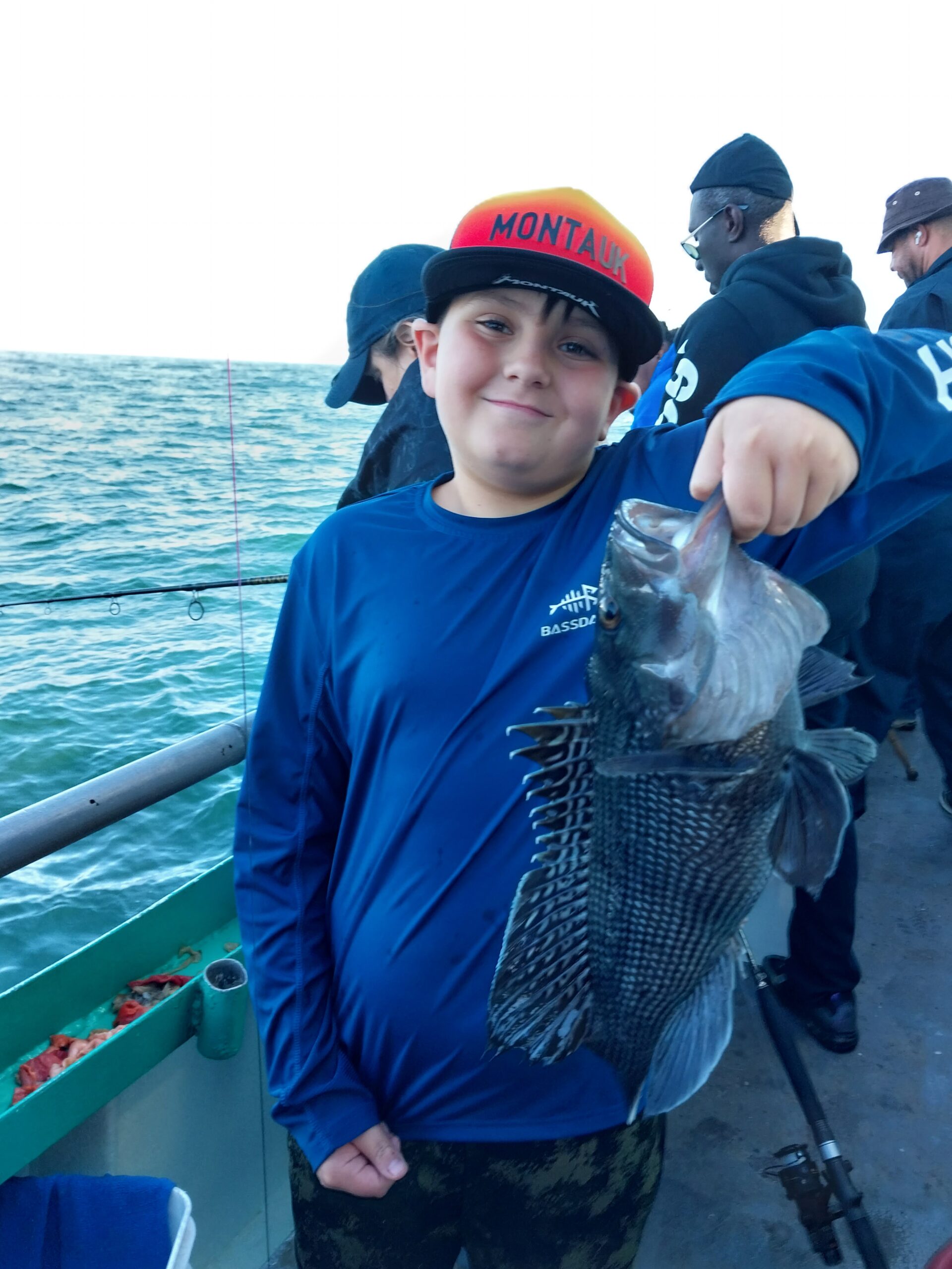 a man holding a glass of water