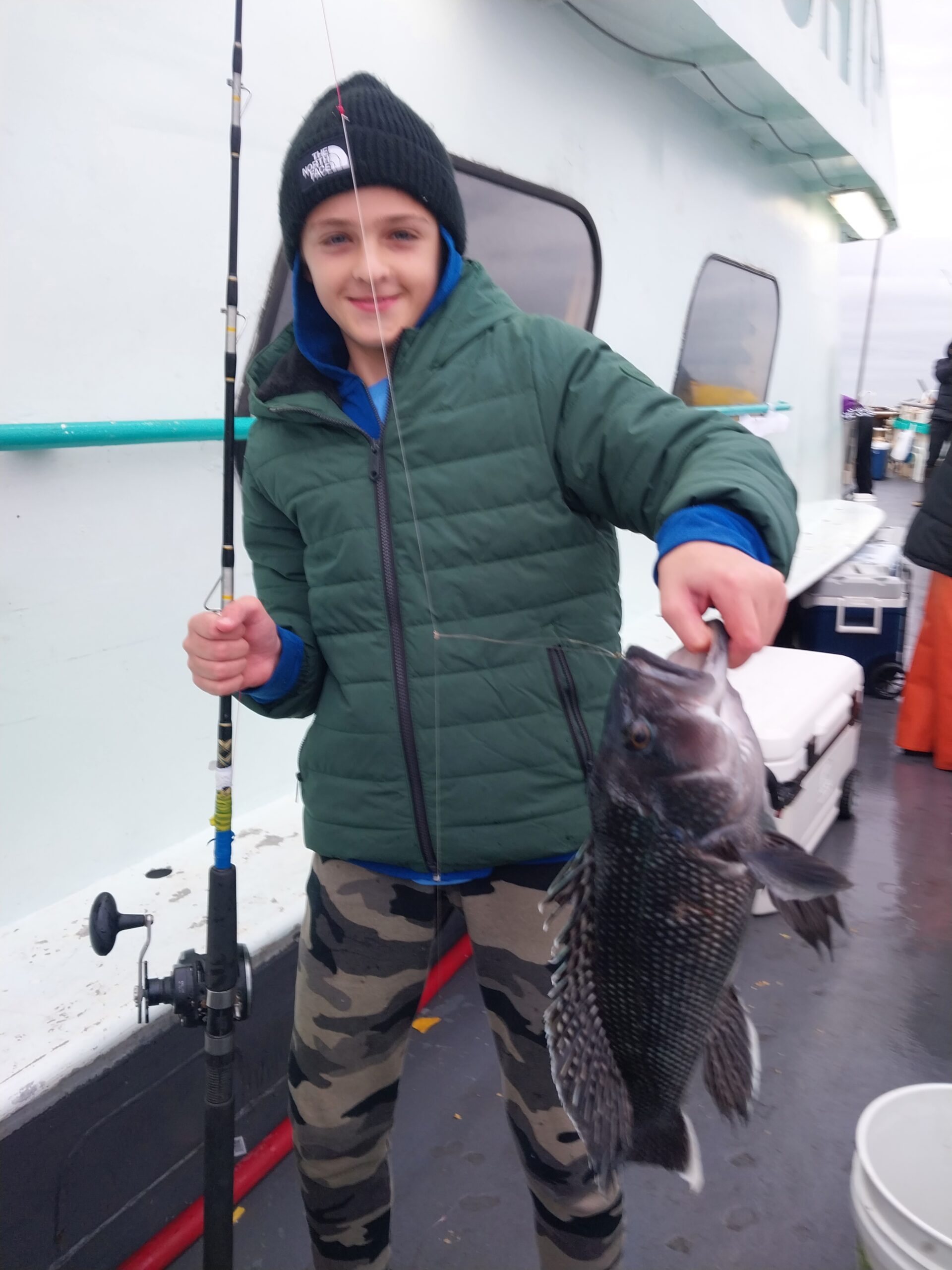 a person holding a fish