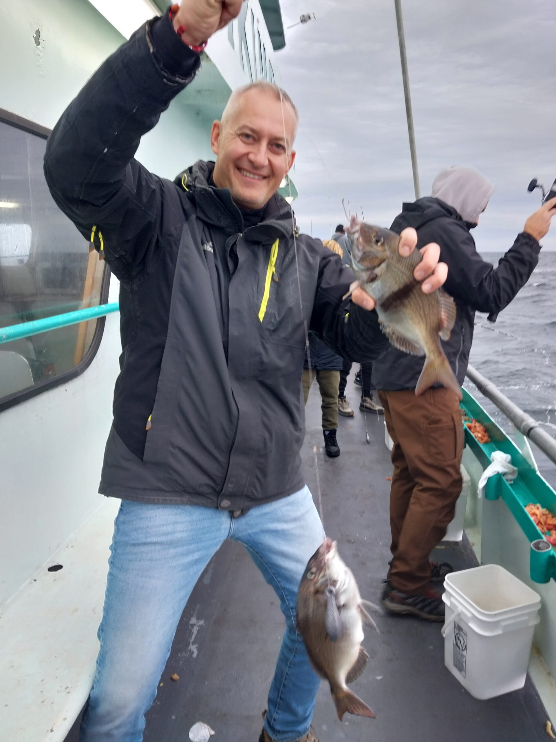 a person holding a fish