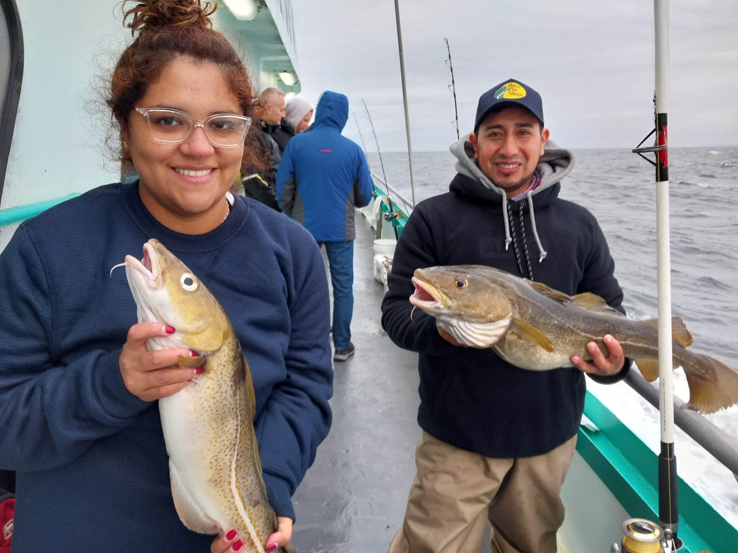 a person holding a fish