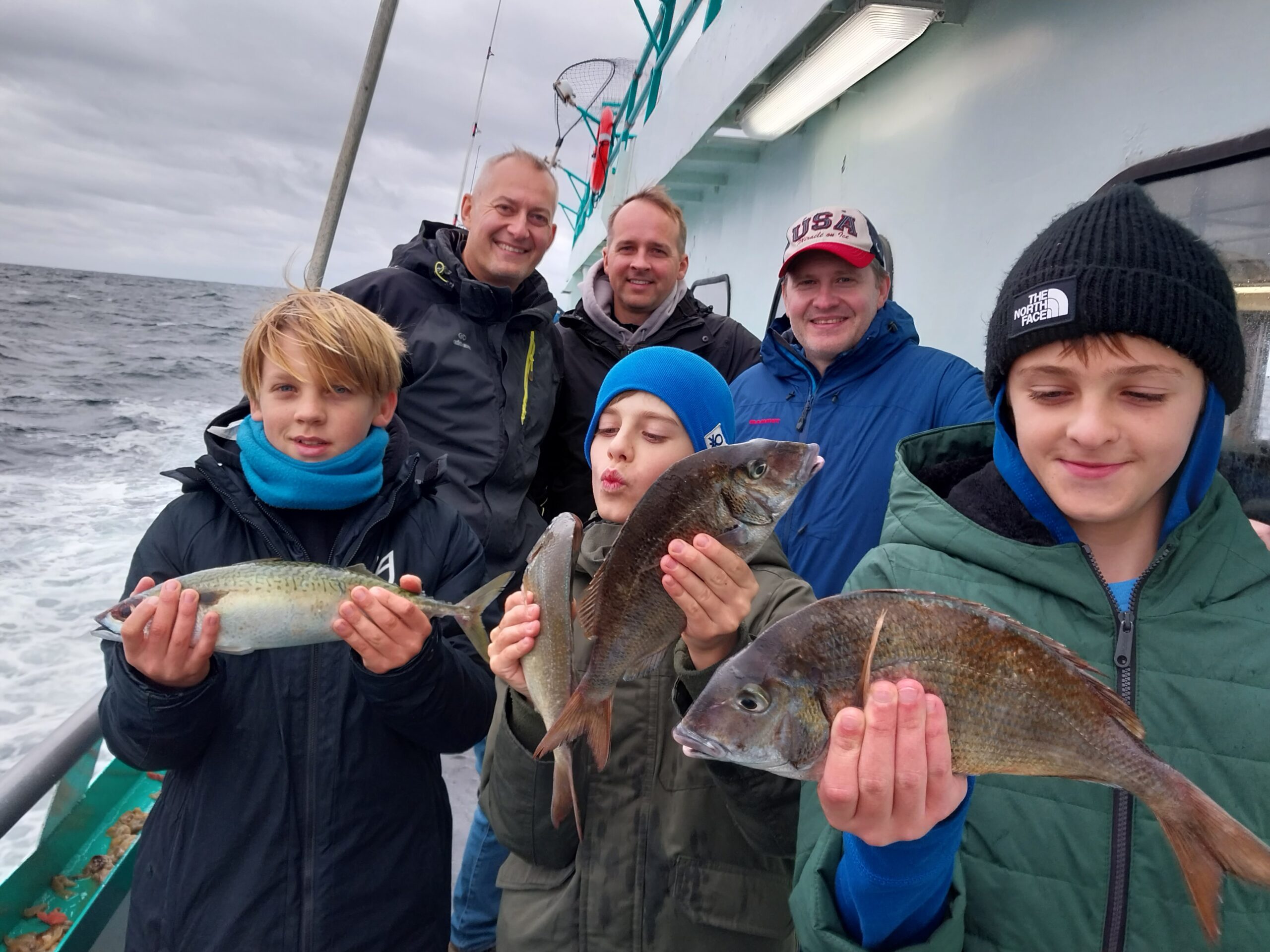 a person holding a fish