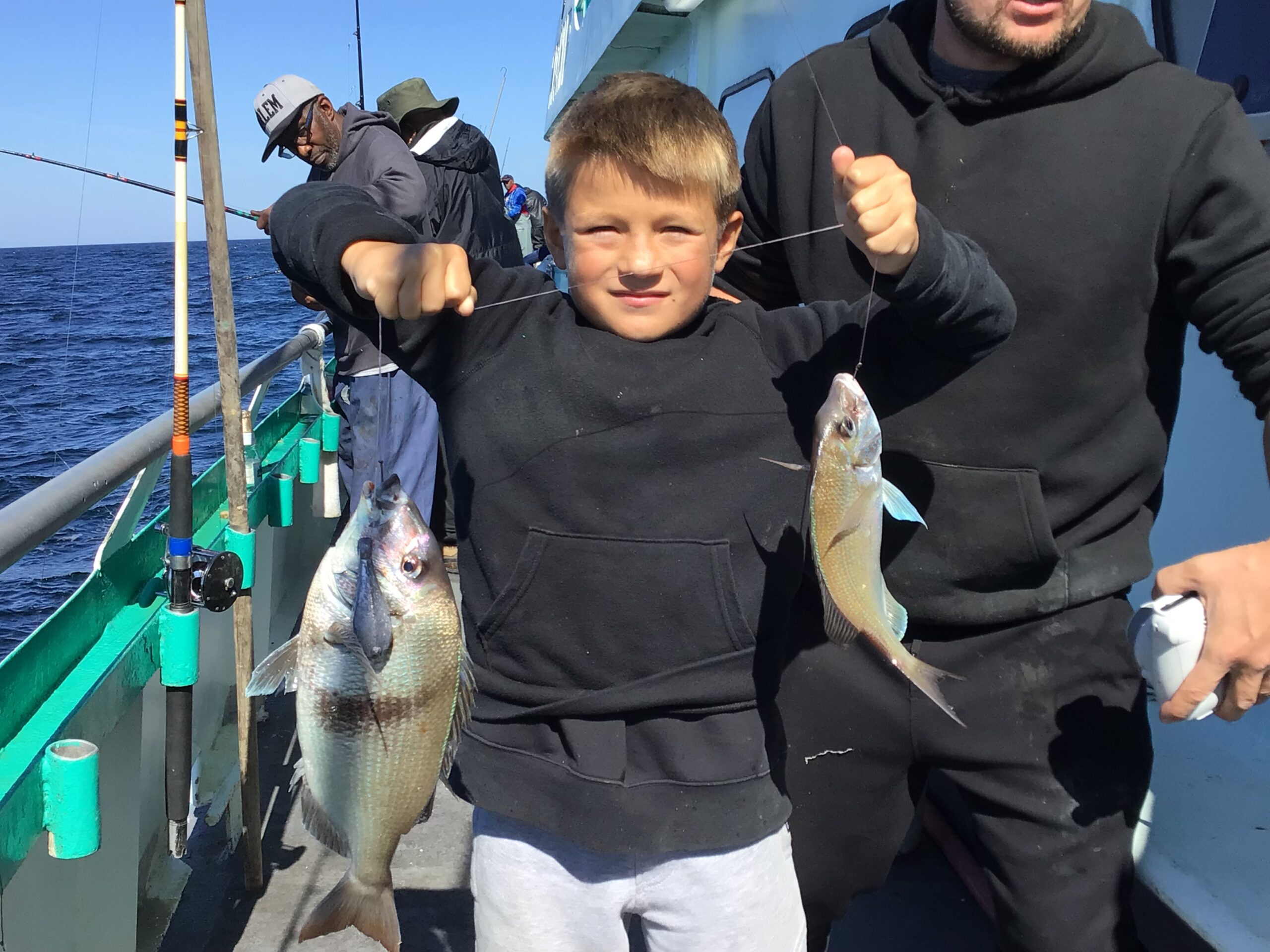 a person holding a fish