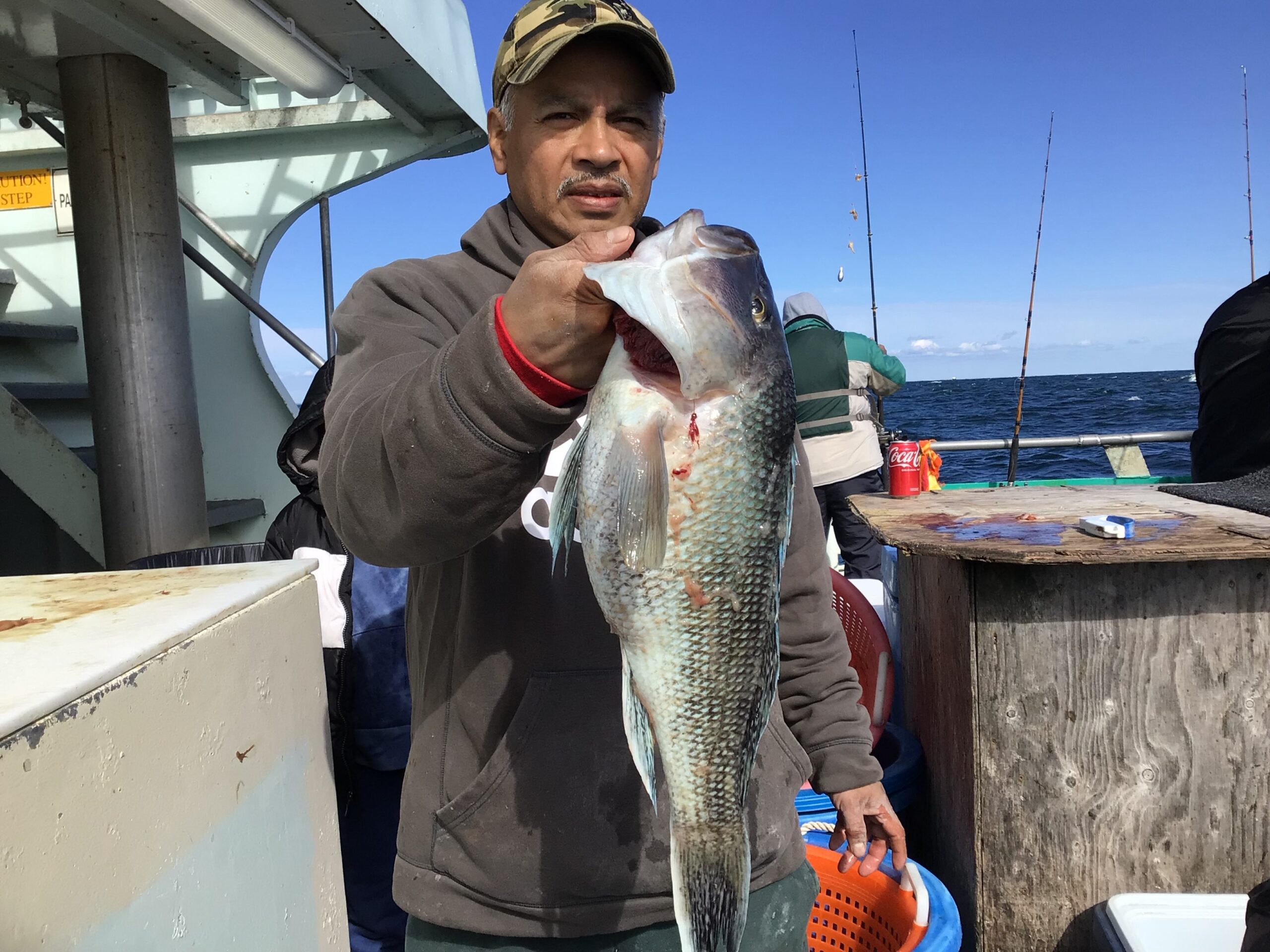a person holding a fish