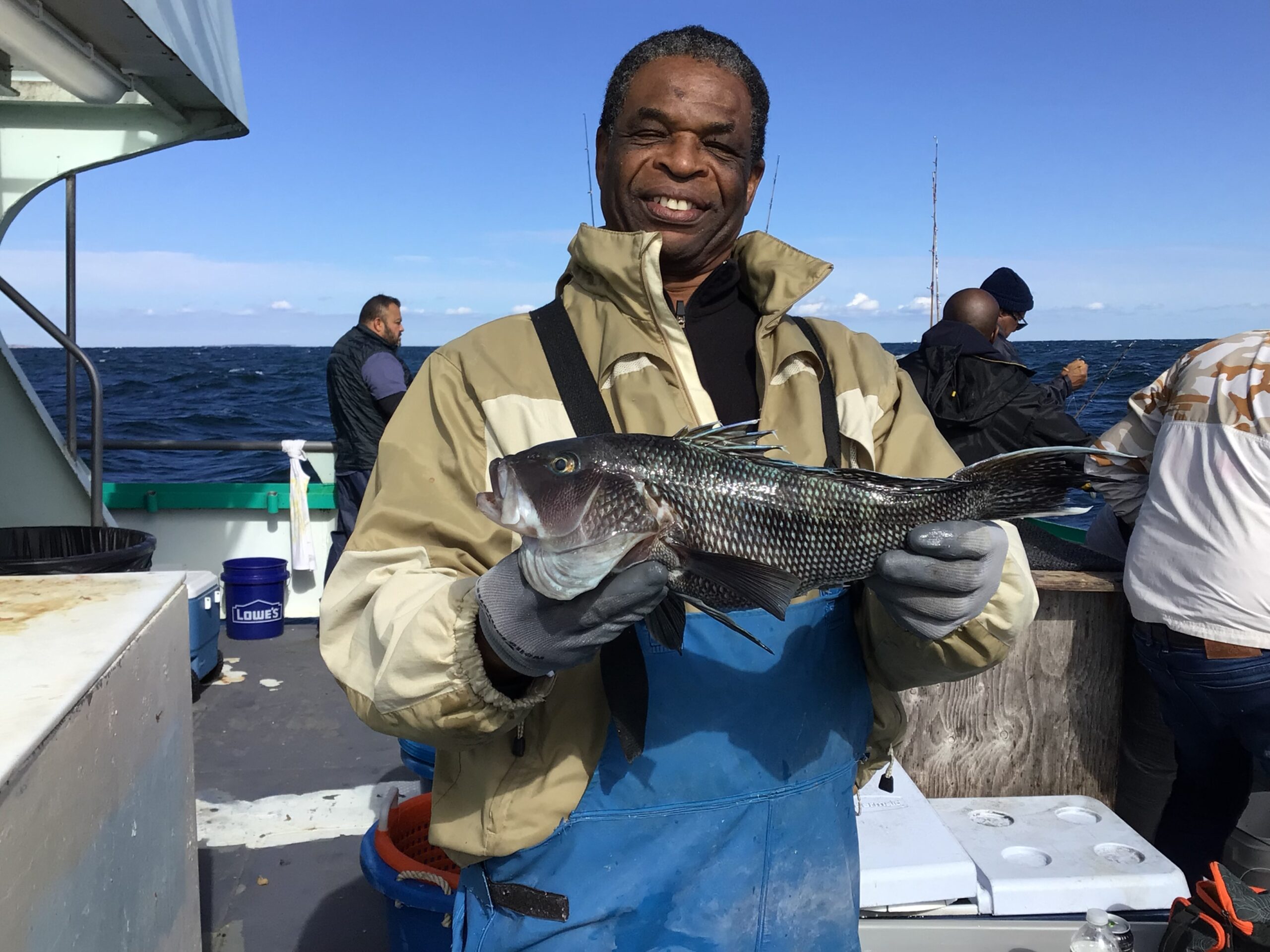a man holding a fish