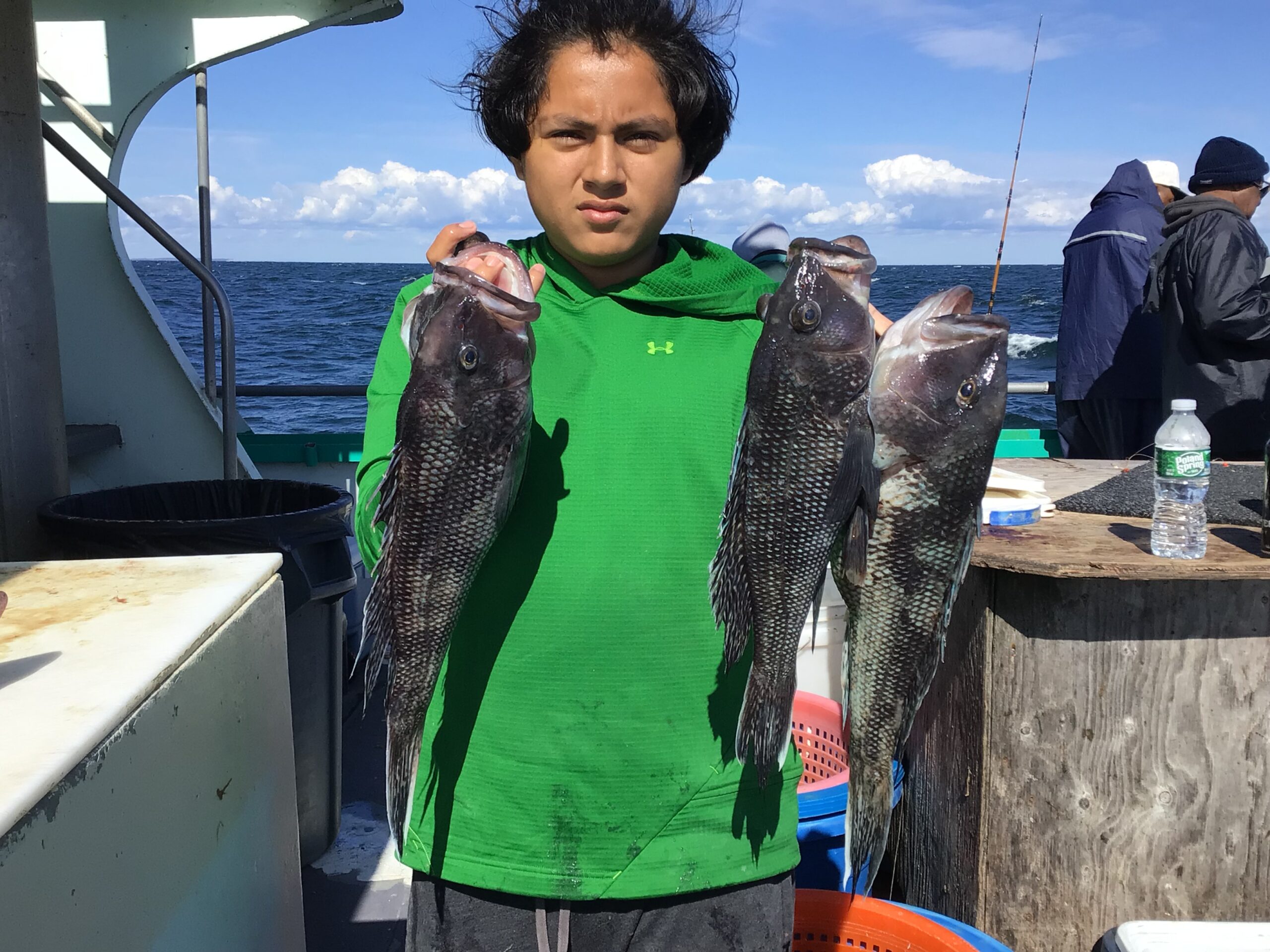 a person holding a fish