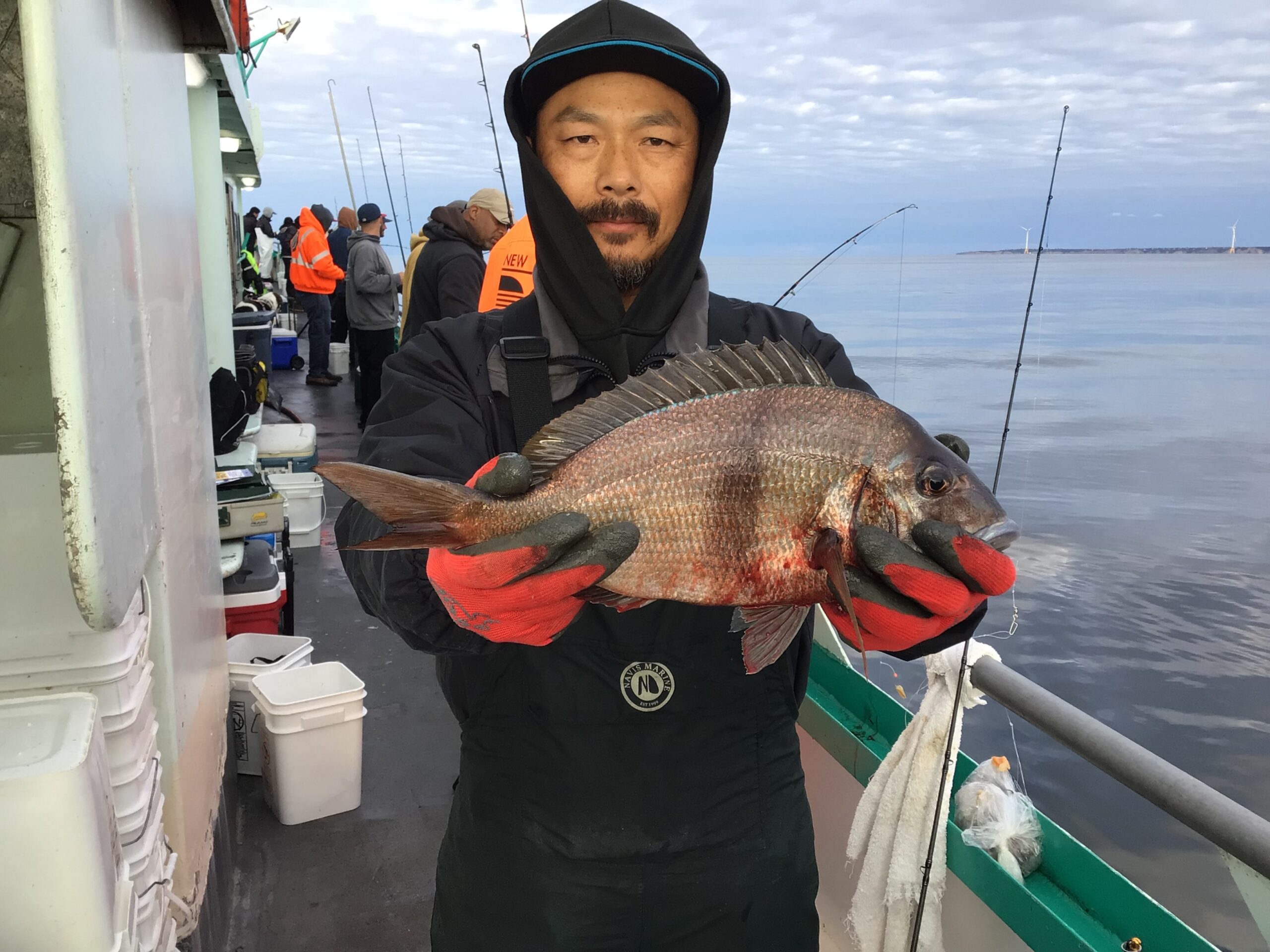 a person holding a fish