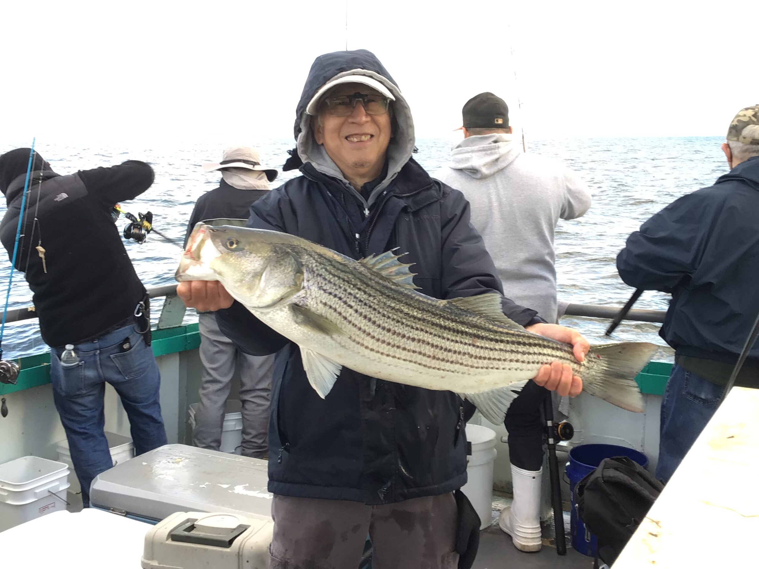 a person holding a fish