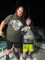 a person standing posing for the camera