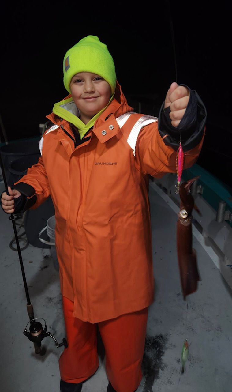 a little boy wearing a hat