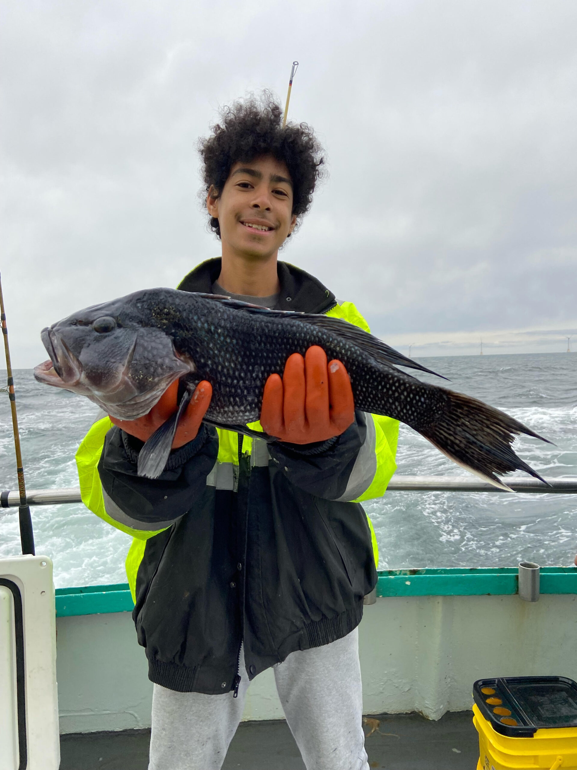 a man carrying a surf board