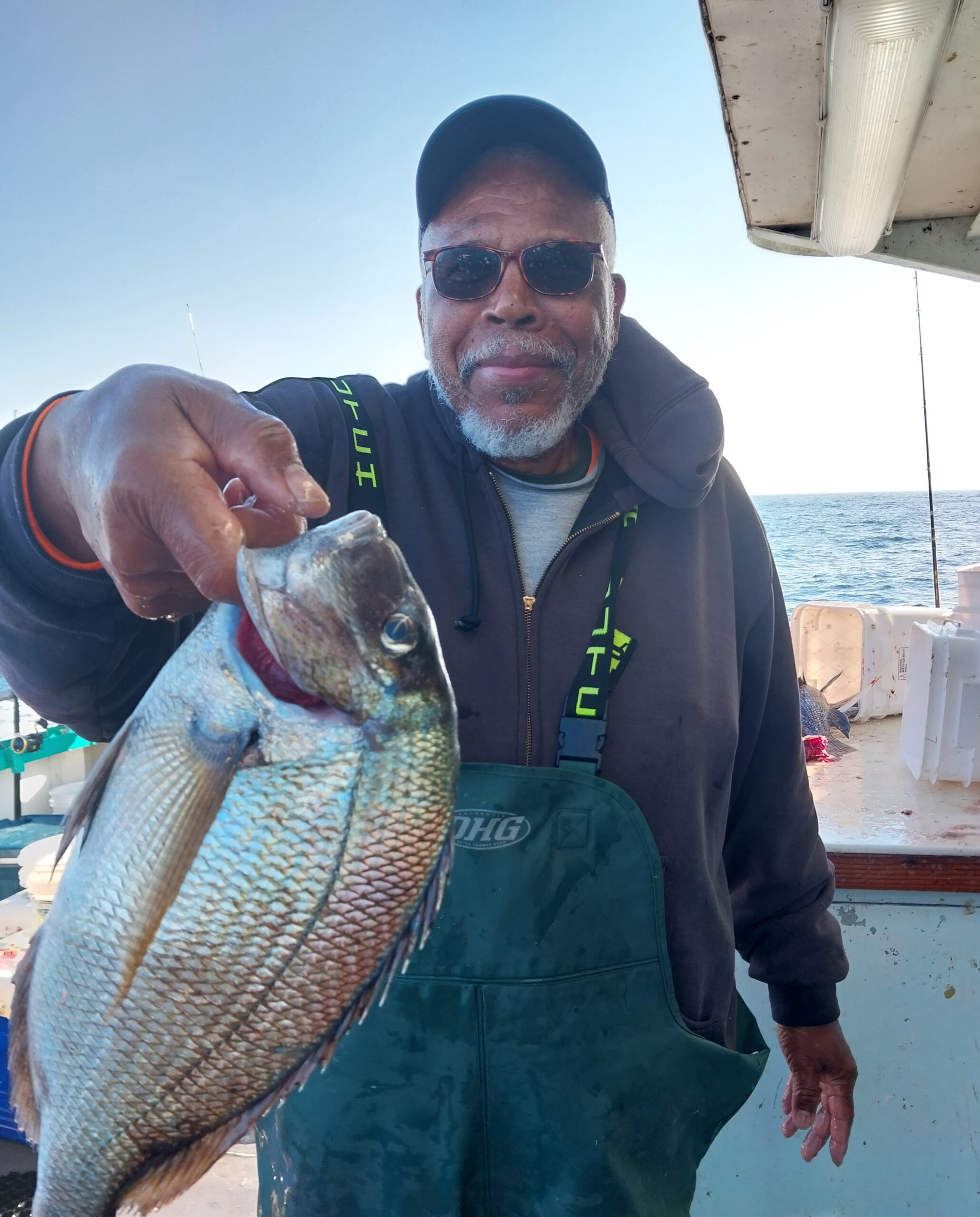 a person holding a fish
