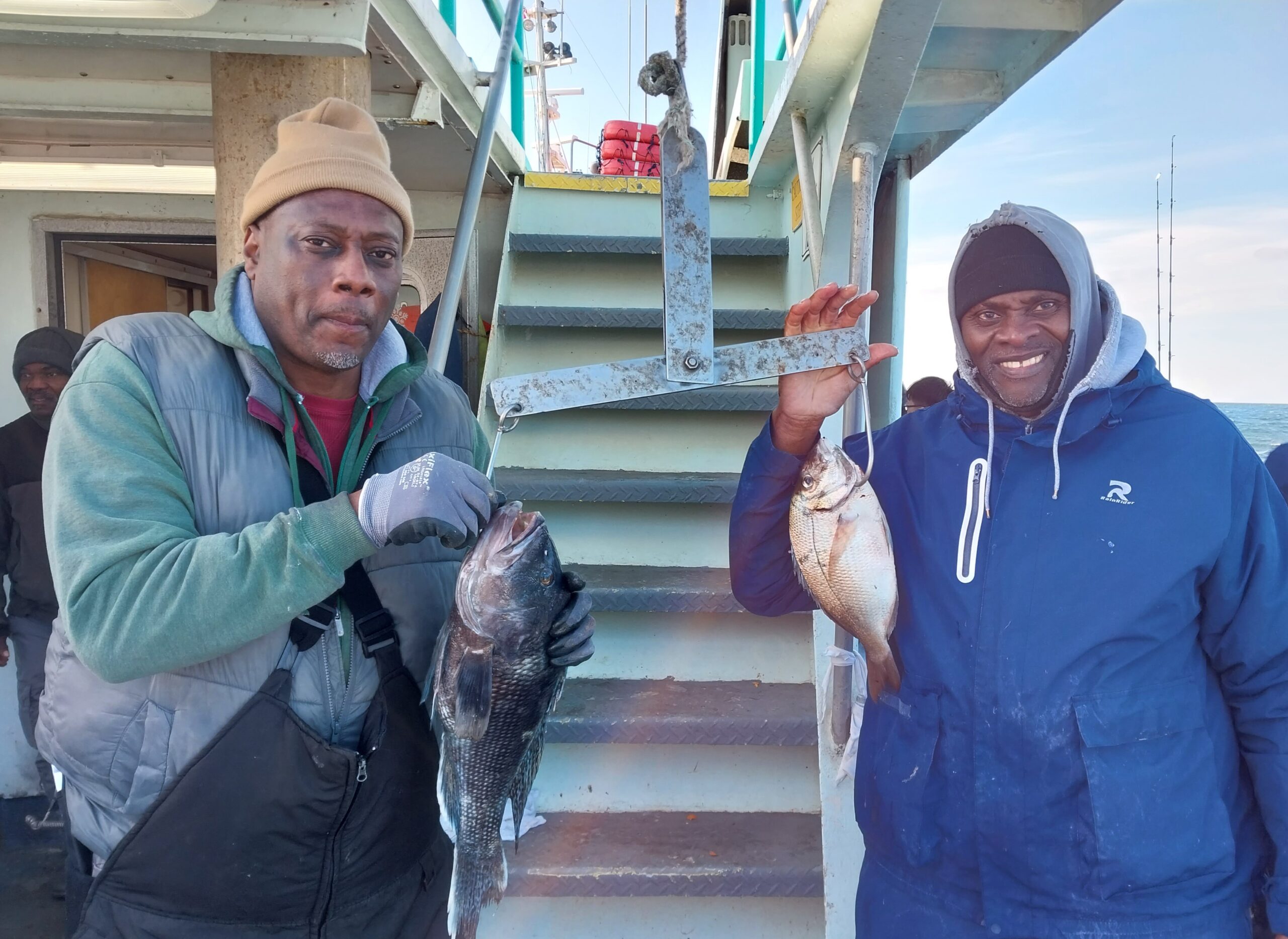 a person holding a fish