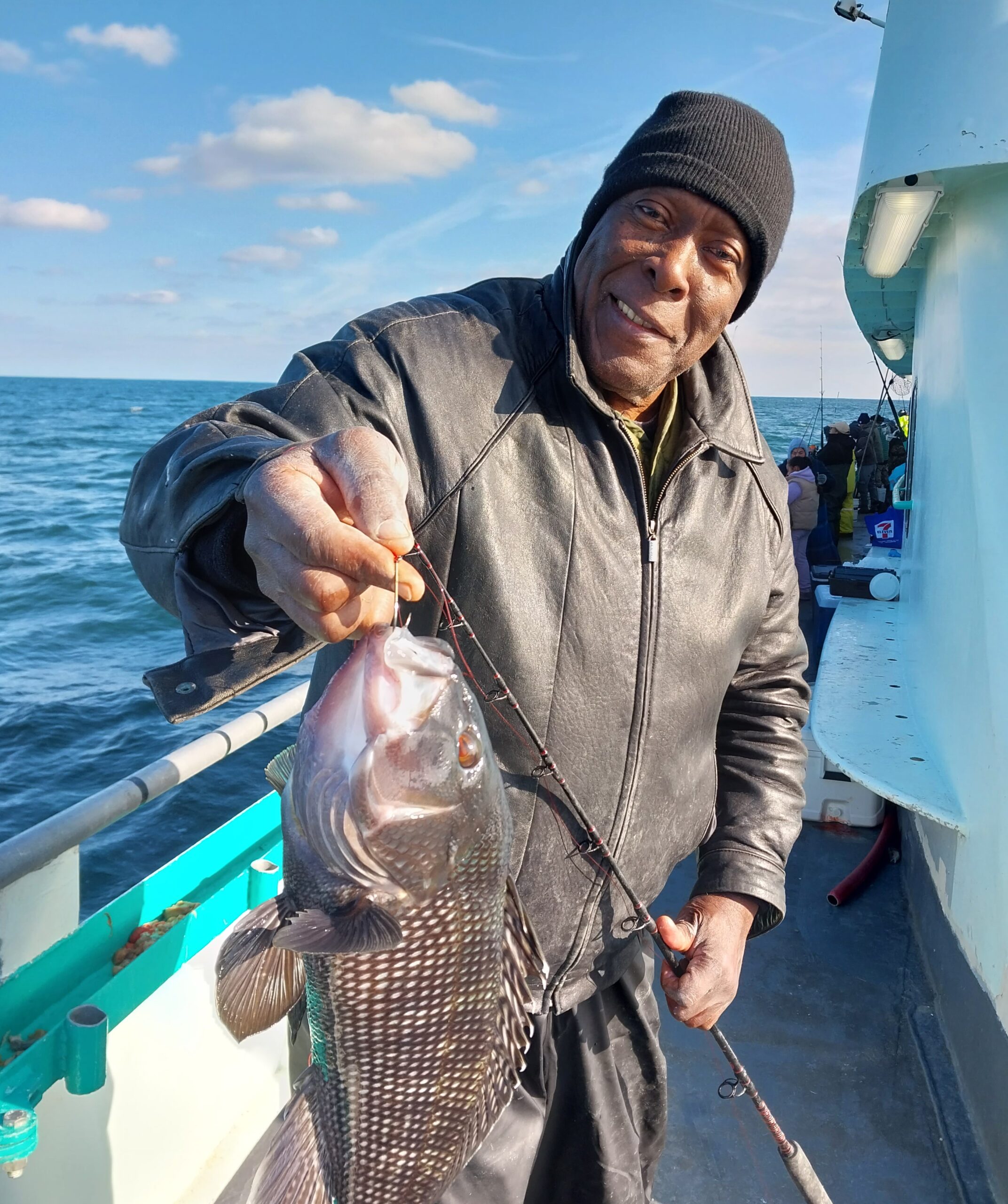 a man that is standing in the water
