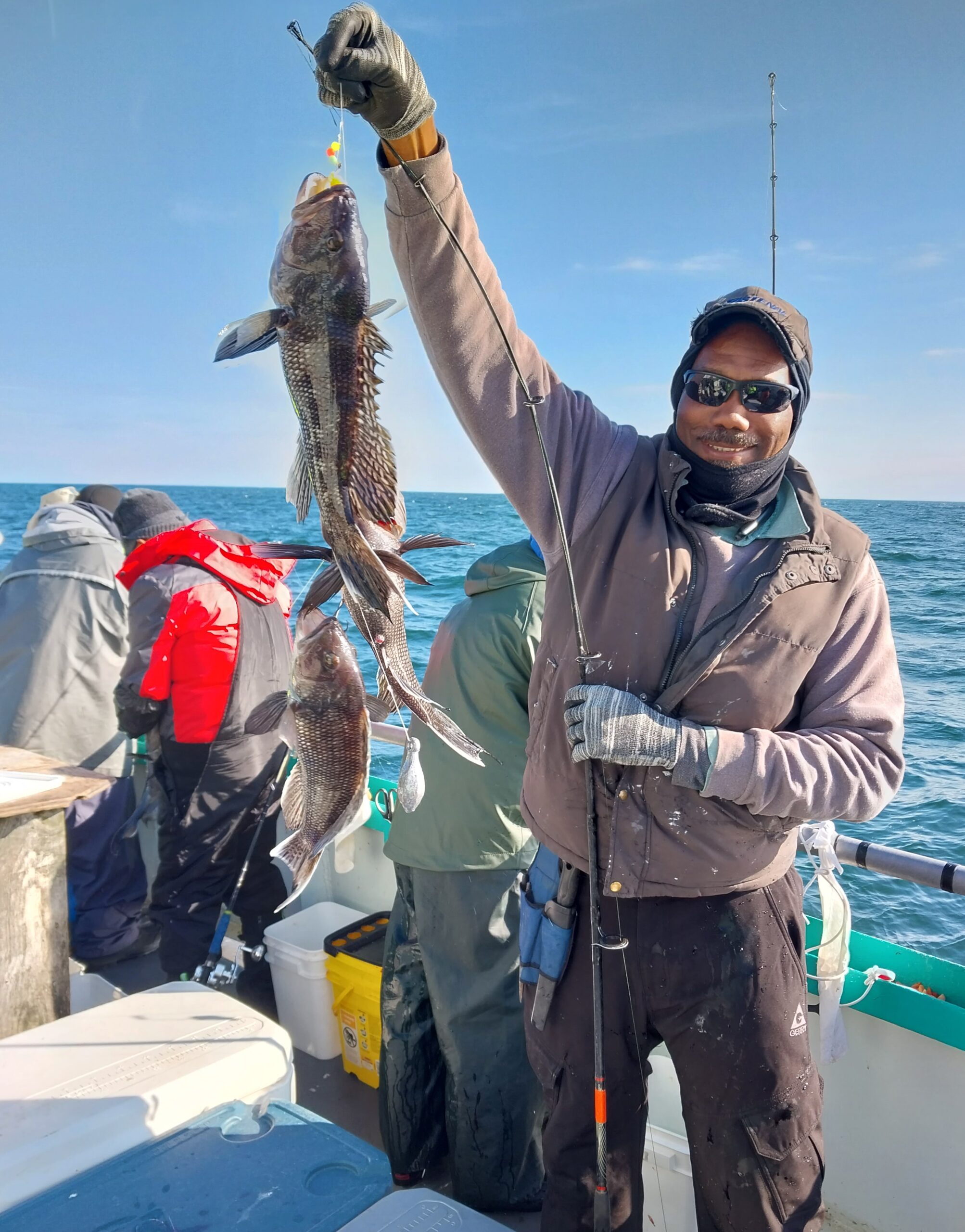 a person holding a fish