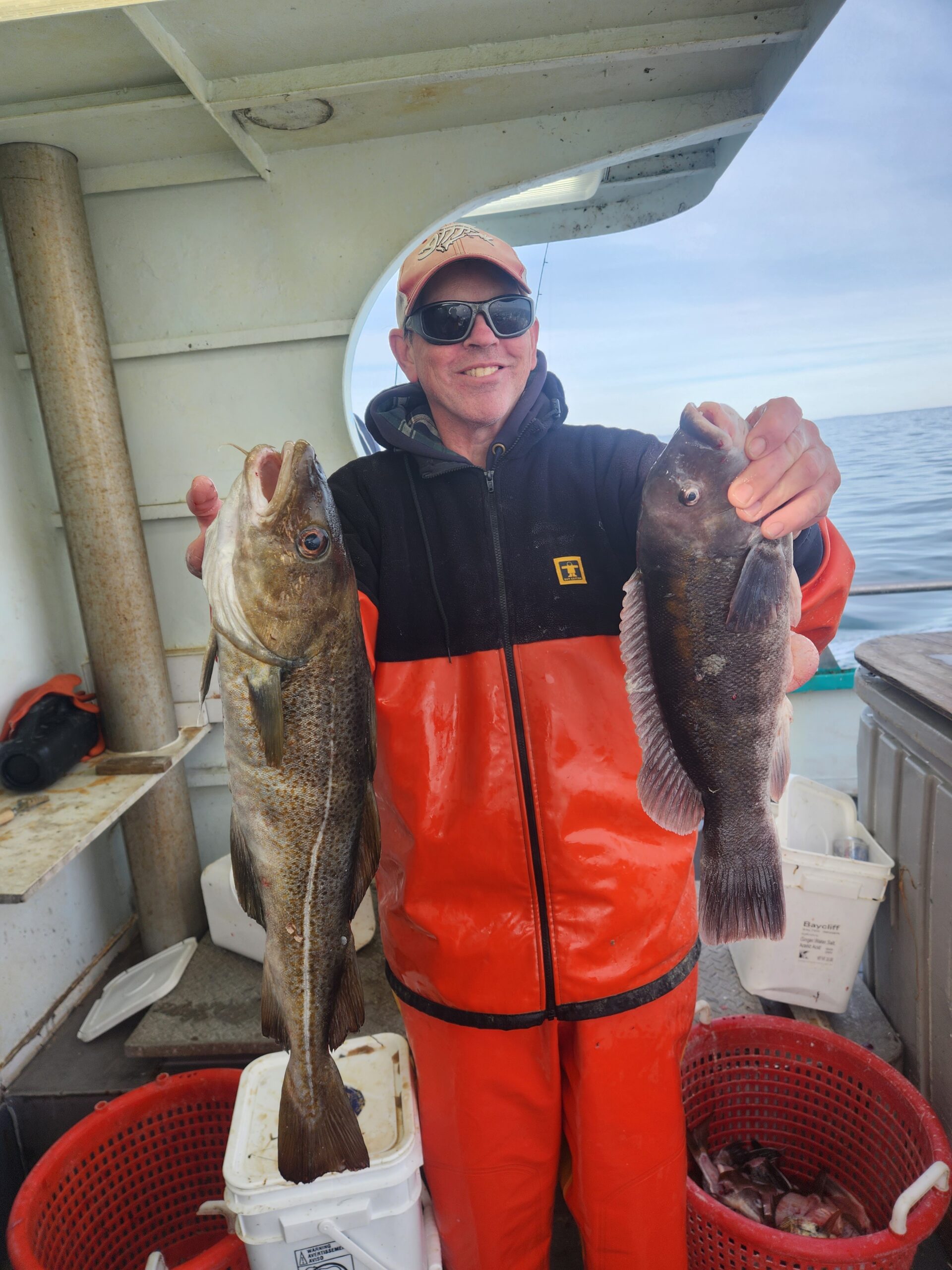 a person holding a fish