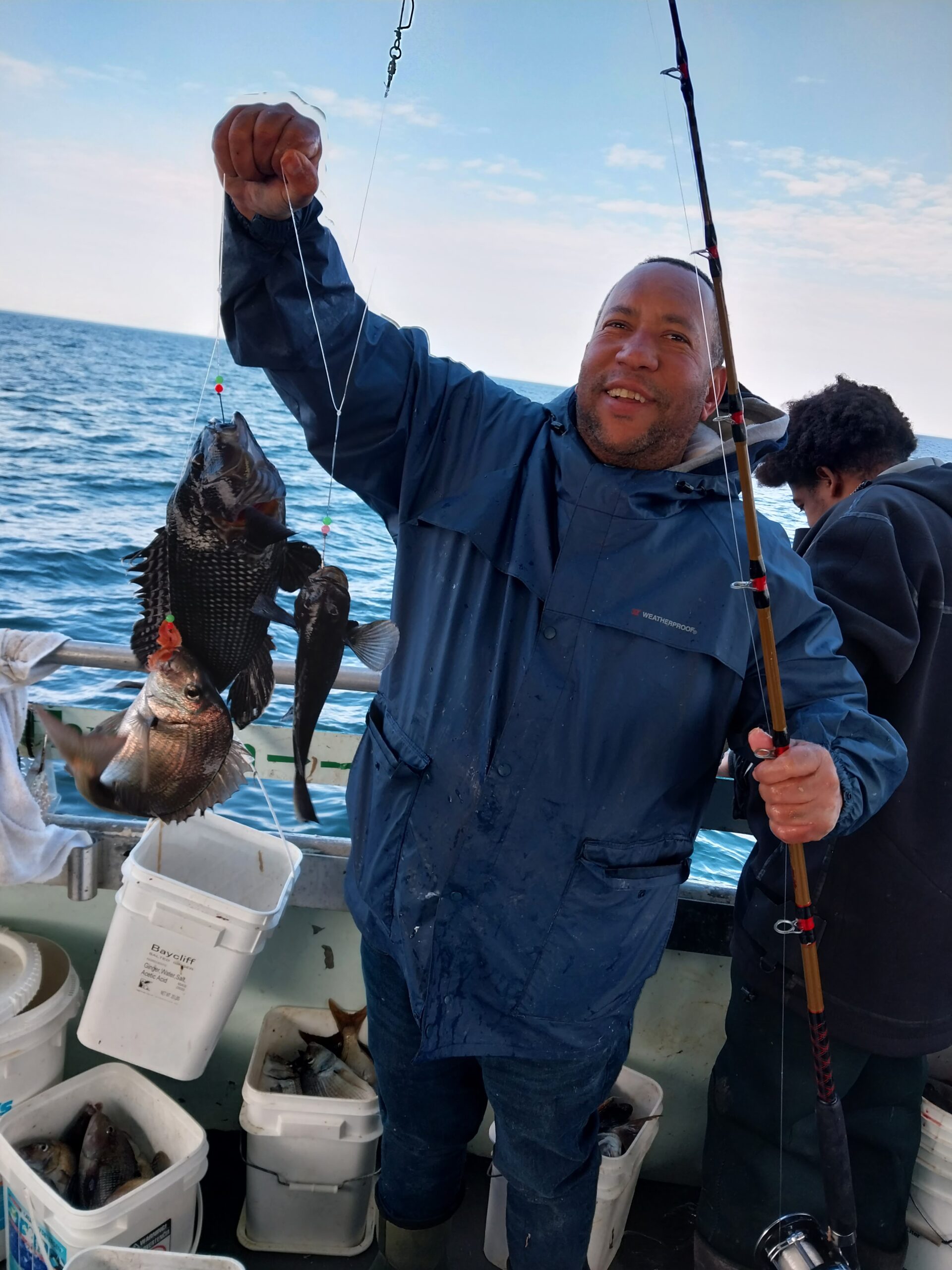 a person holding a fish