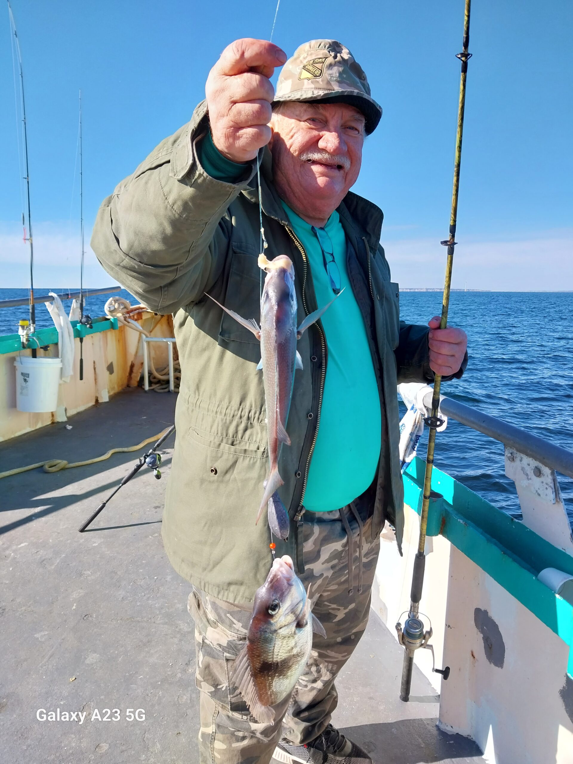 a person standing next to a boat