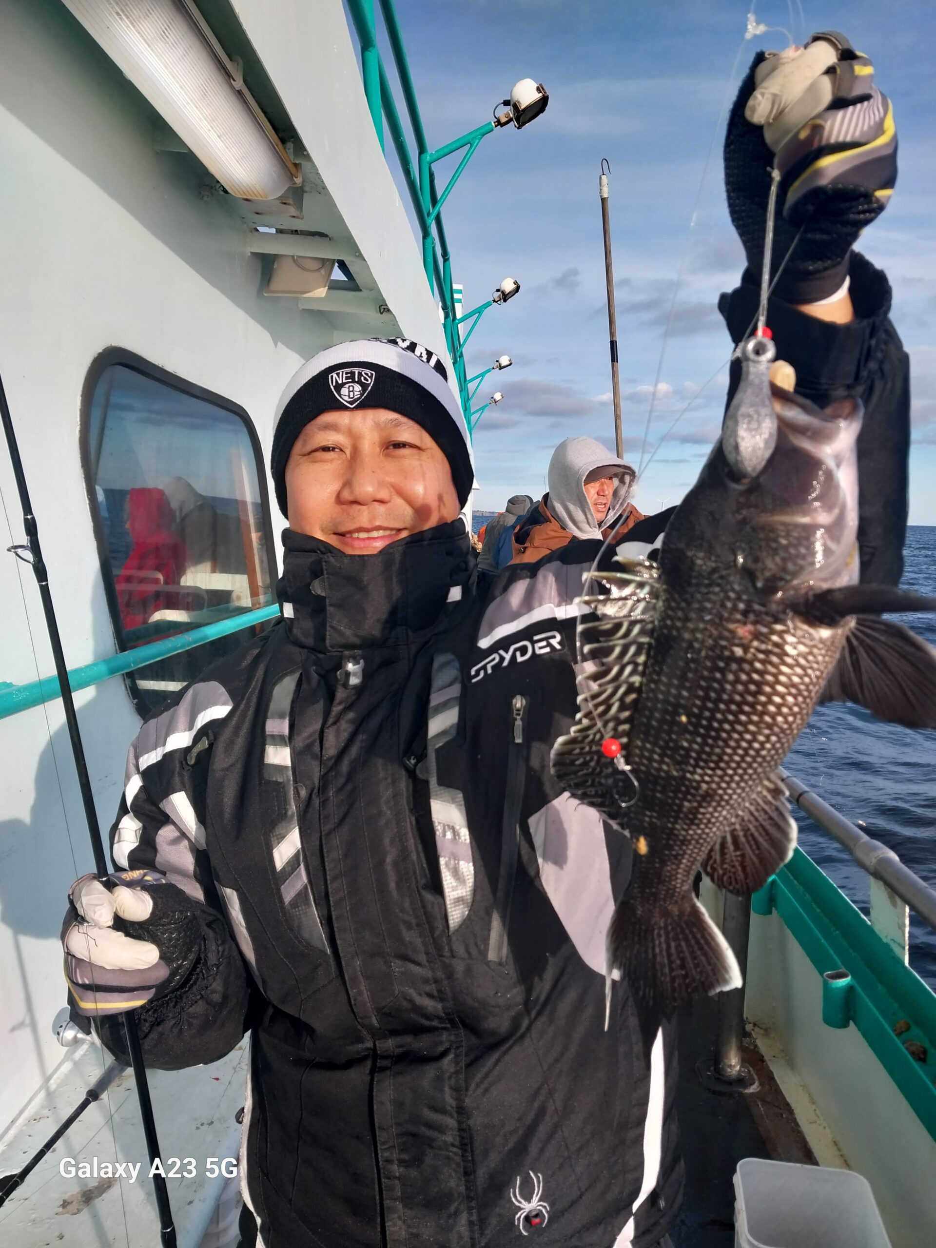 a couple of people that are standing in the snow