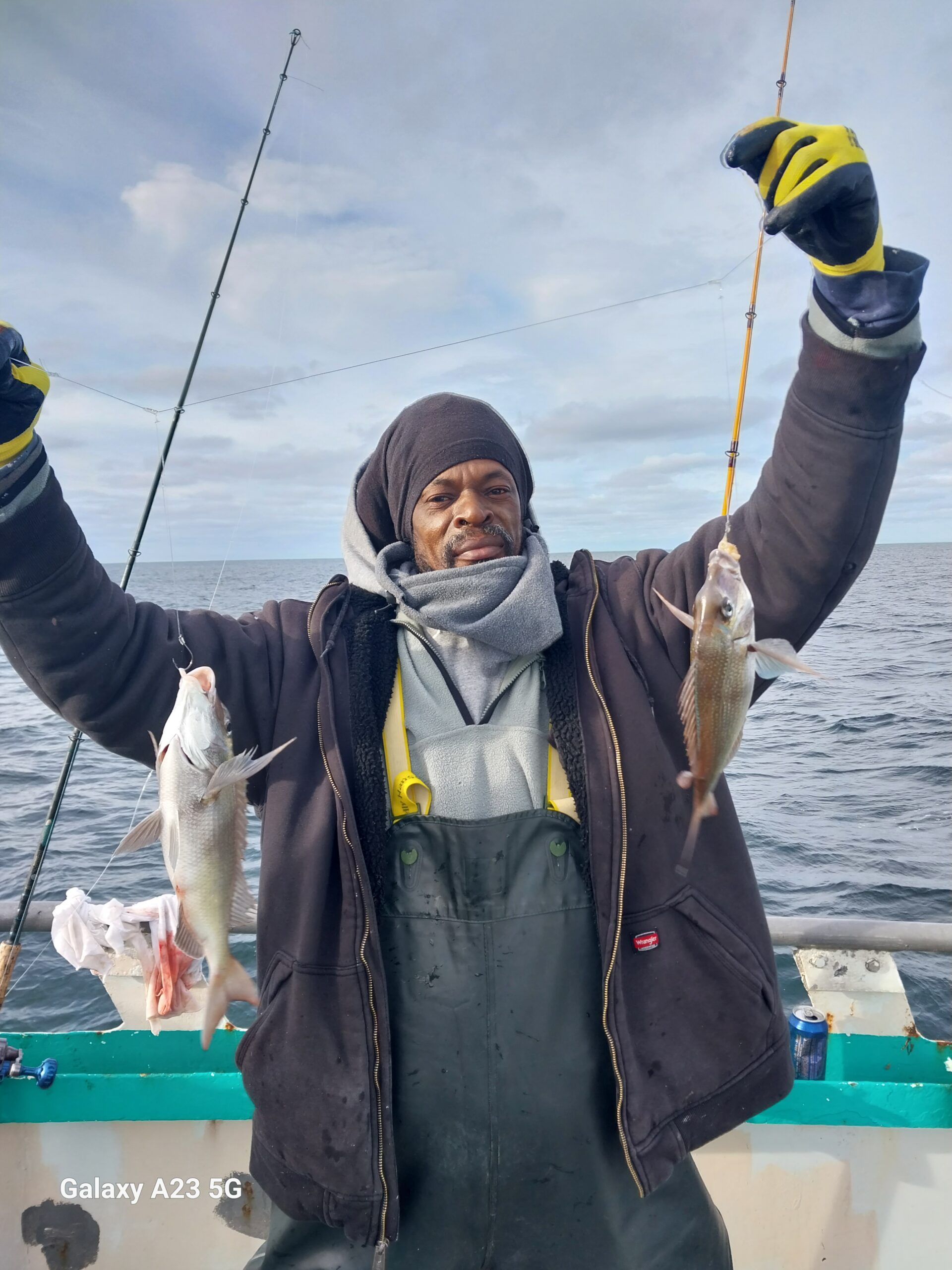 a person standing in front of water