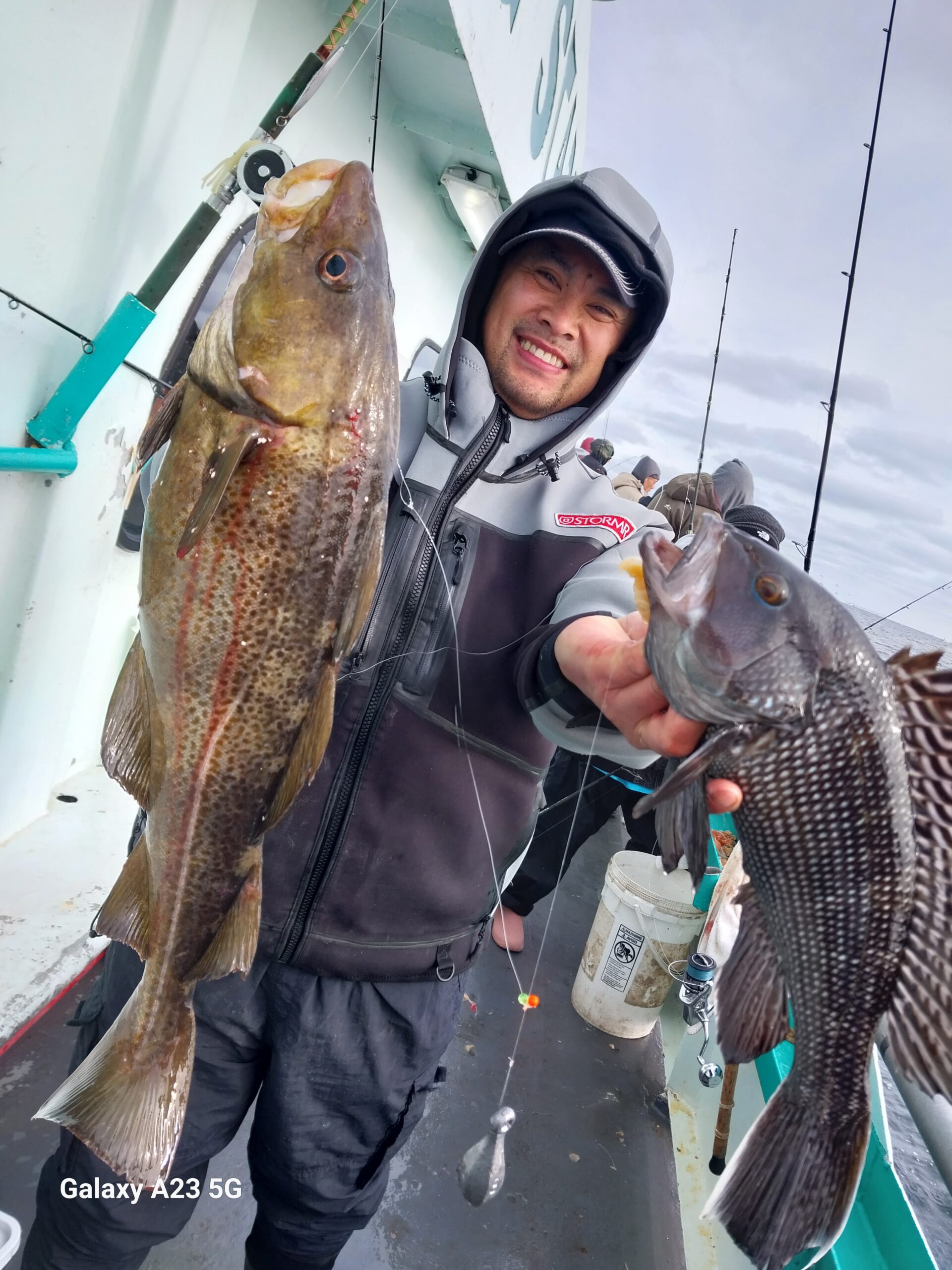 a person holding a fish