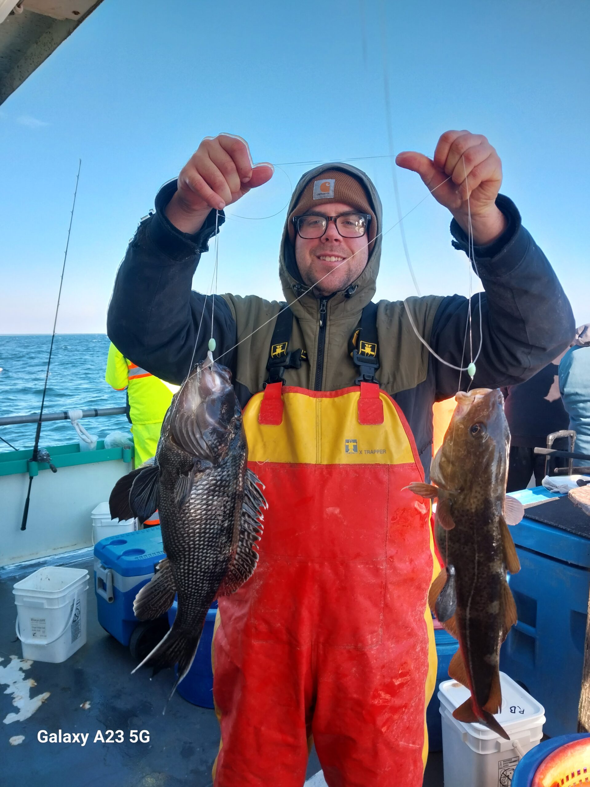 a person holding a fish