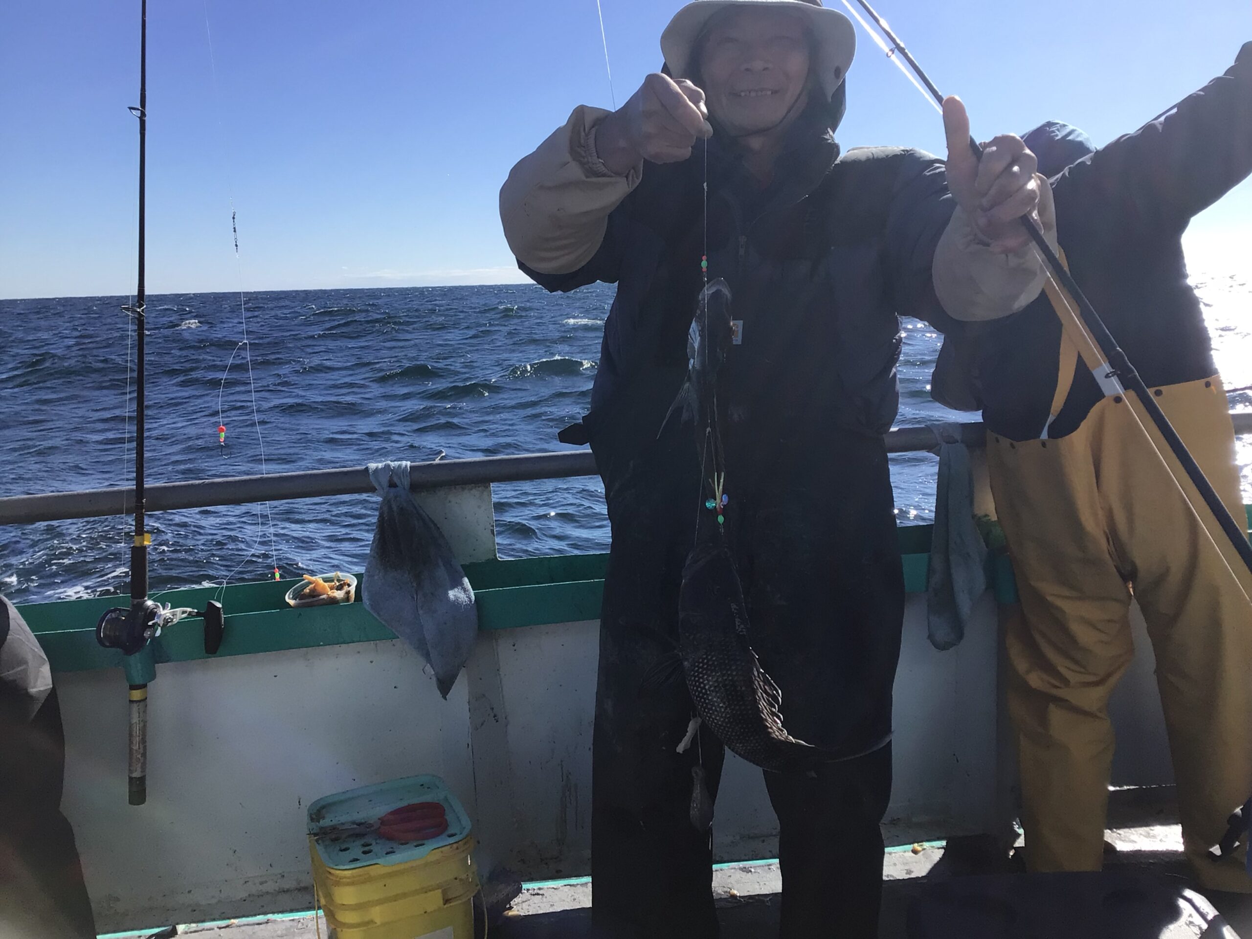 a person standing on a boat in the water