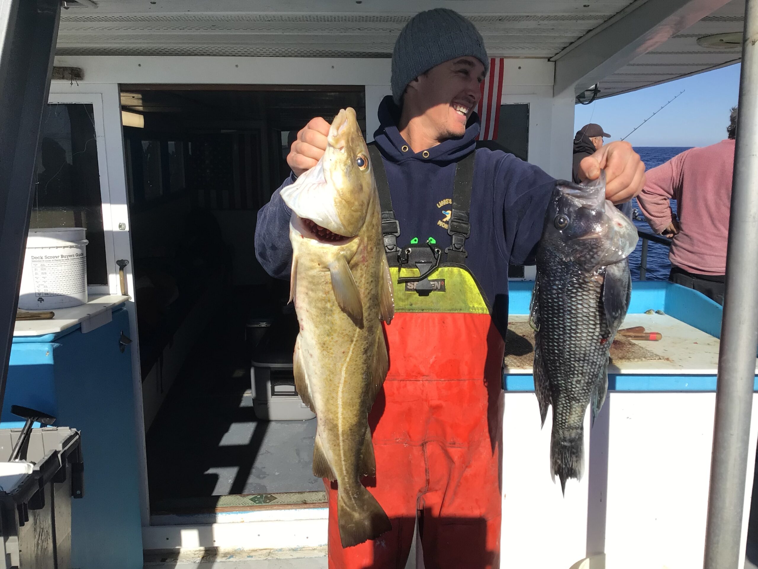 a man holding a fish